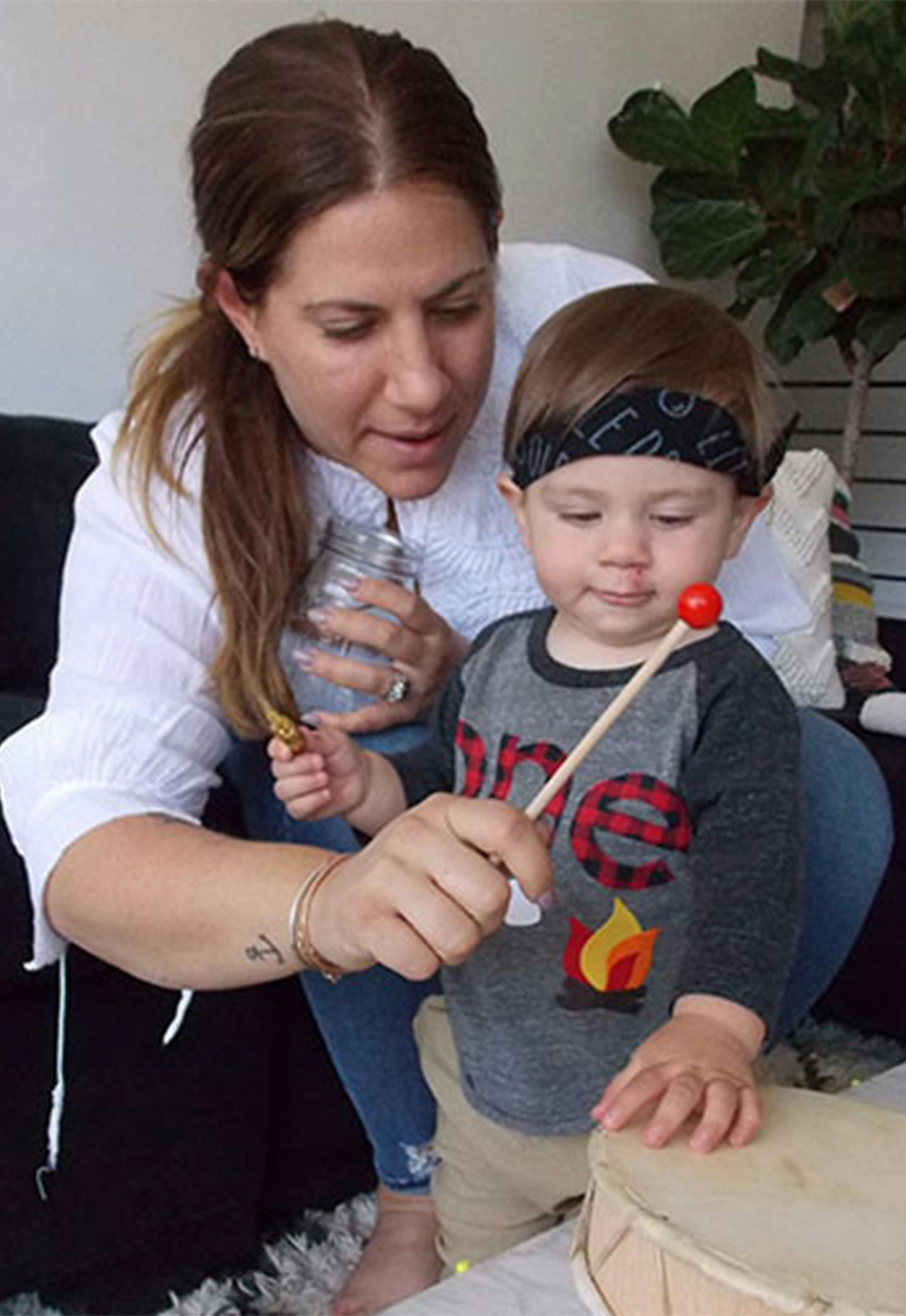 New mother Lara Hogan plays with her son, Zion, at their Topanga, Calif., home. Hogan said she monitors her blood pressure regularly and is determined to stay on top of her health. ‚EURoeAs much as it‚EUR(TM)s not fresh in my mind and I don‚EUR(TM)t want to be thinking about my future heart health ‚EUR¶ this is like priority No. 1 for my health right now,‚EURù she says. (Anna Gorman/California Healthline) ORG XMIT: 1206261