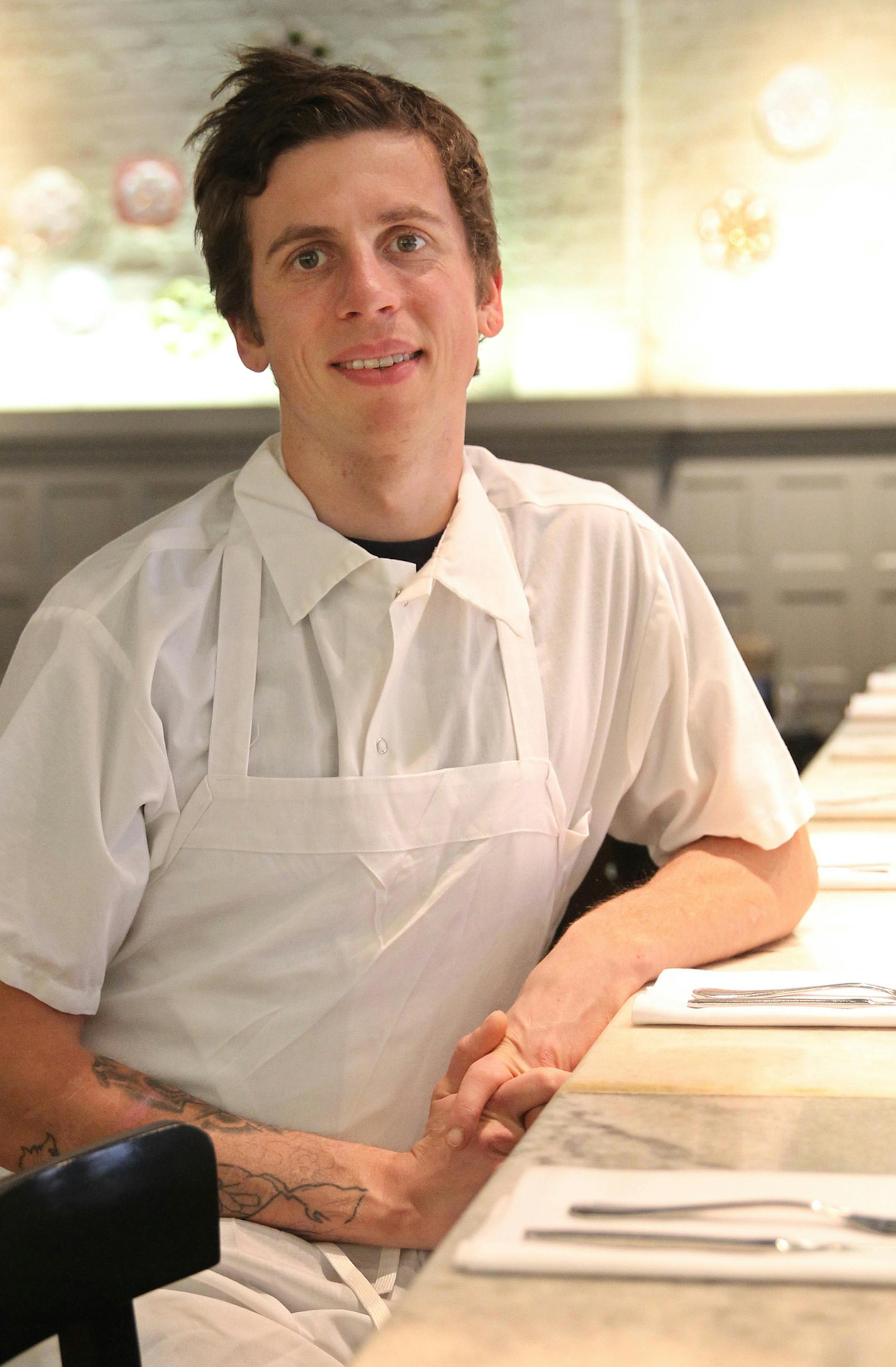 Brett Naylor is a cook at the Sandom Street Oyster House that will now have a mathching 401-K plan. Managers, servers and oyster shuckers at the Oyster House are getting a unique benefit, a 401-K plan with a company match. Is this part of the tightening labor market? (Michael Bryant/Philadelphia Inquirer/TNS) ORG XMIT: 1181986