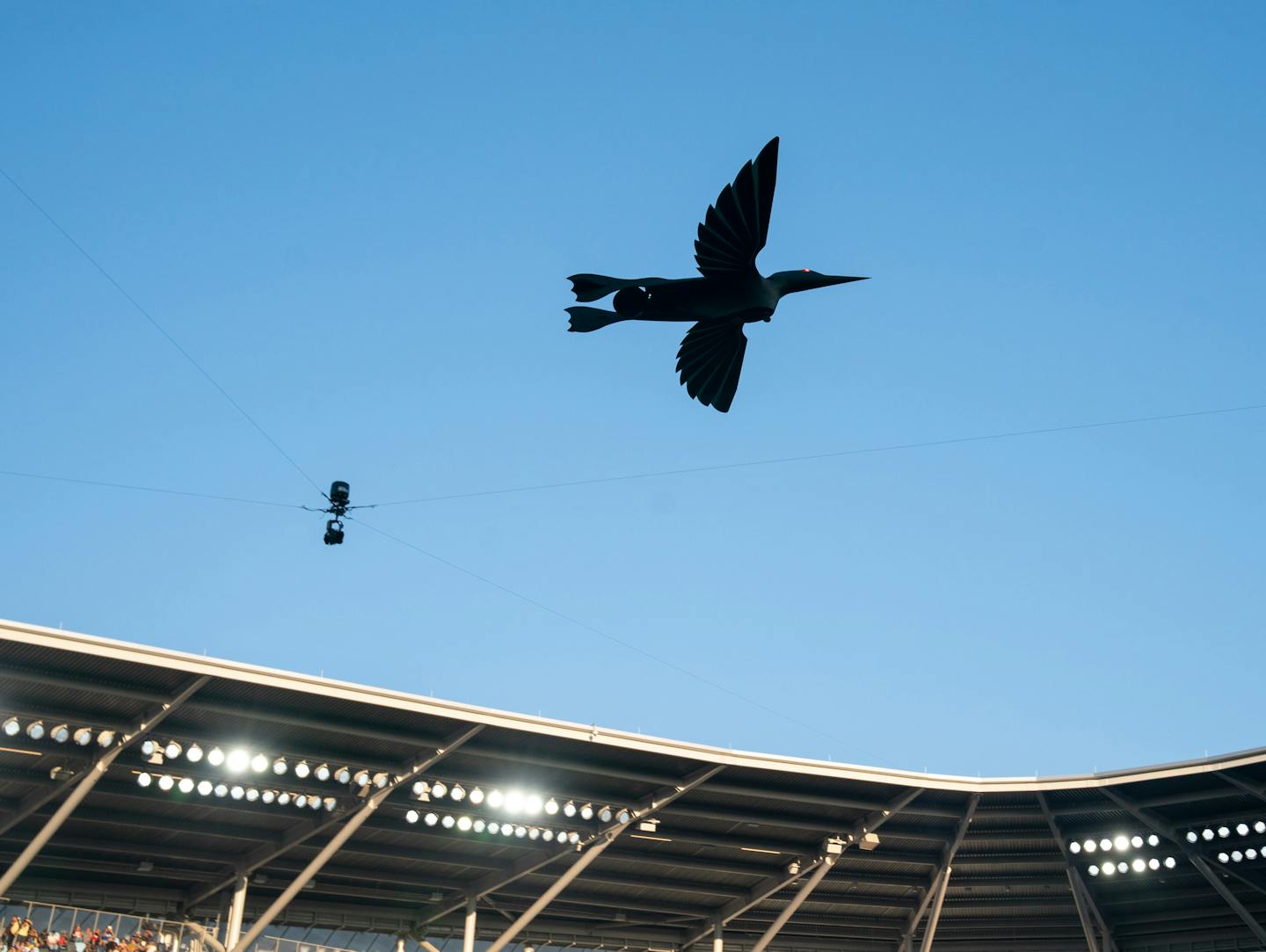 A mechanical loon flies over the crowd during the opening ceremony at the MLS All-Star Game against LIGA MX Wednesday, Aug. 10, 2022 at Allianz Field in St. Paul, Minn. ]