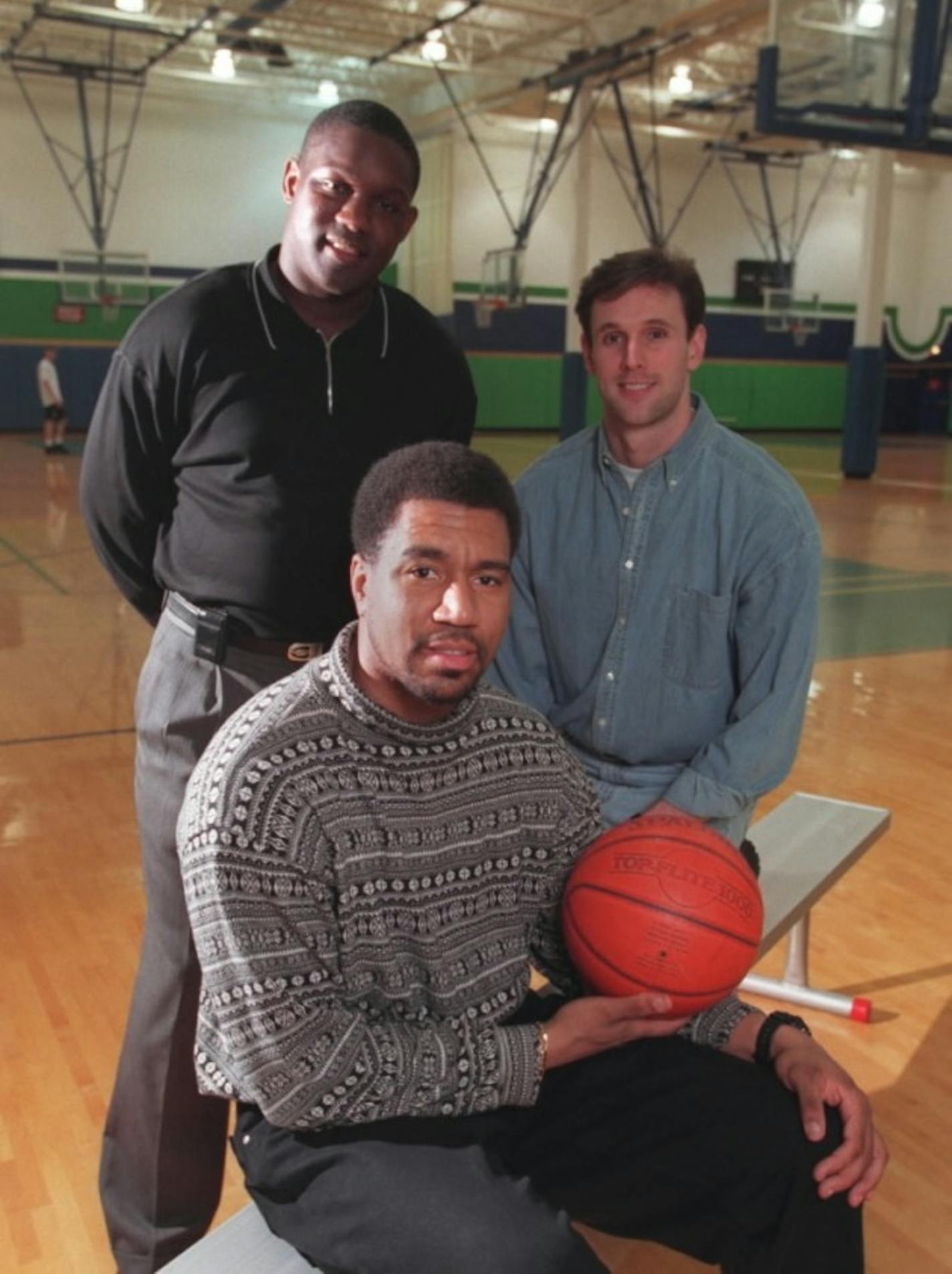 Kevin Lynch (right) with 89-90 teammates Melvin Newbern (front) and Connell Lewis.