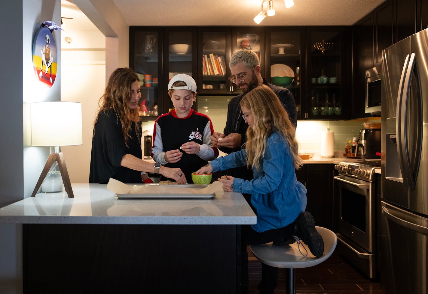 'The Golden Bachelor' contestant Leslie Fhima spends time with her son Zack Chazin and grandchildren Jackson,10, and Sophia, 6, inside her home in Minneapolis, Minn., on Saturday, Oct. 28, 2023. The group made s'mores cookies, something Fhima frequently made for her fellow contestants on the show. ] SHARI L. GROSS • shari.gross@startribune.com