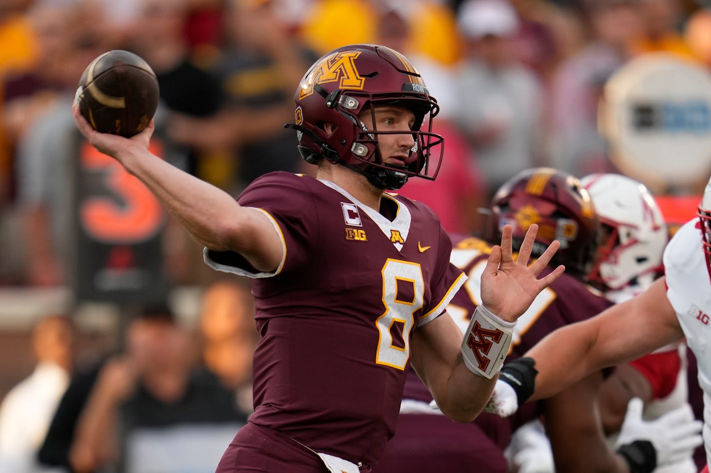 Minnesota quarterback Athan Kaliakmanis (8) passes during the first half of an NCAA college football game against Nebraska, Thursday, Aug. 31, 2023, in Minneapolis. (AP Photo/Abbie Parr)