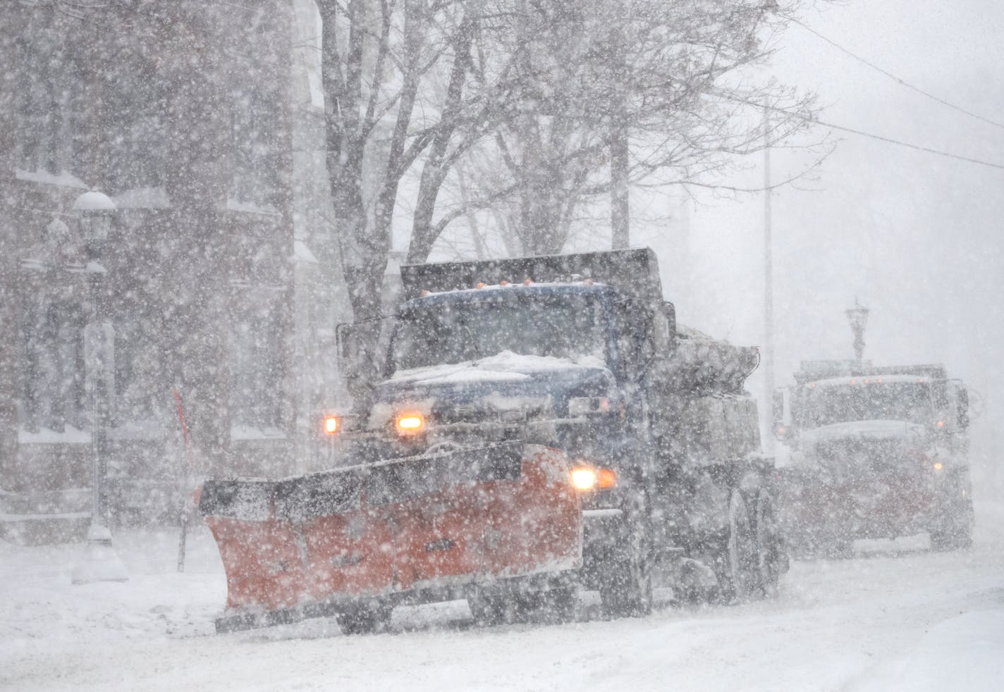 FILE - City of St. Paul plow trucks make their way down Western Avenue in January 2018. ORG XMIT: MIN1801221649481748