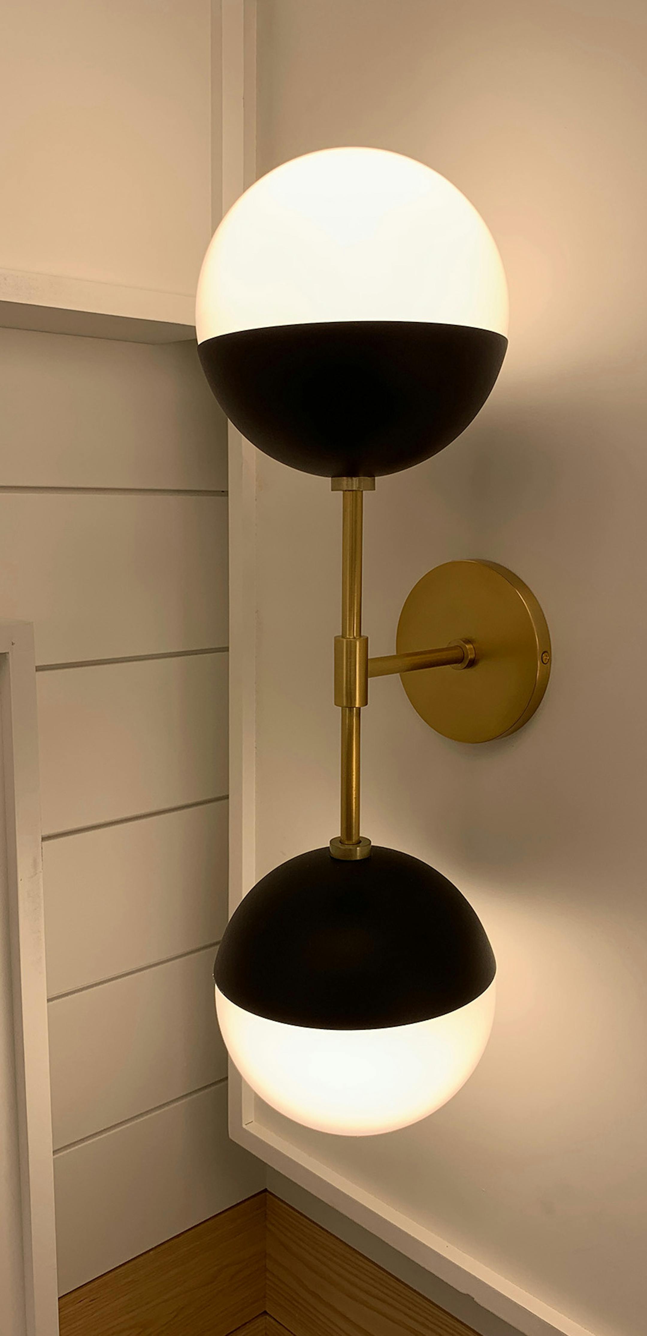 An art deco-inspired wall sconce. (Design Recipes/TNS)