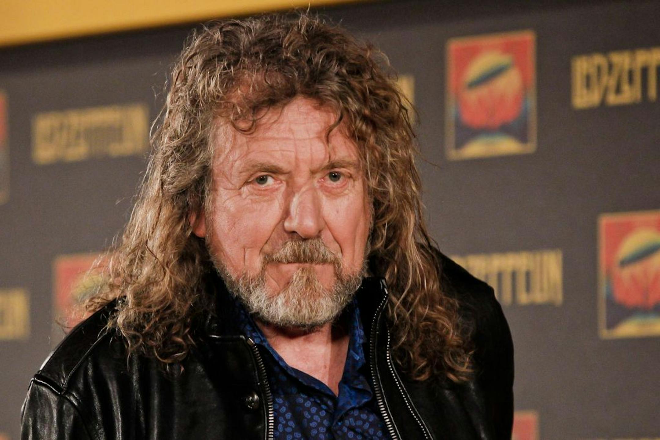 Led Zeppelin frontman Robert Plant poses for a photo at a media screening ahead of the worldwide theatrical release of Led Zeppelin's 2007 Celebration Day concert at the O2, Friday, Sept. 21, 2012, in London.