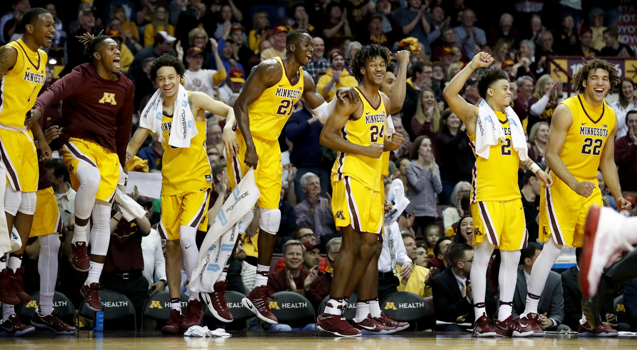 Players on the Gophers bench reacted to a basket by a teammate in the final minute of the game. Minnesota beat Nebraska by a final score of 88-73.