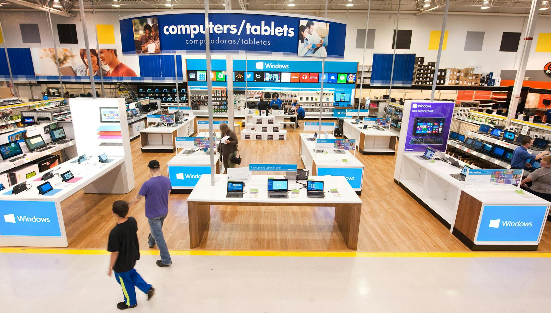The Windows store-within-a-store at Best Buy will cover 2,000 square feet. Analysts see the stores as a move by Microsoft to counter Apple’s Best Buy acreage.
