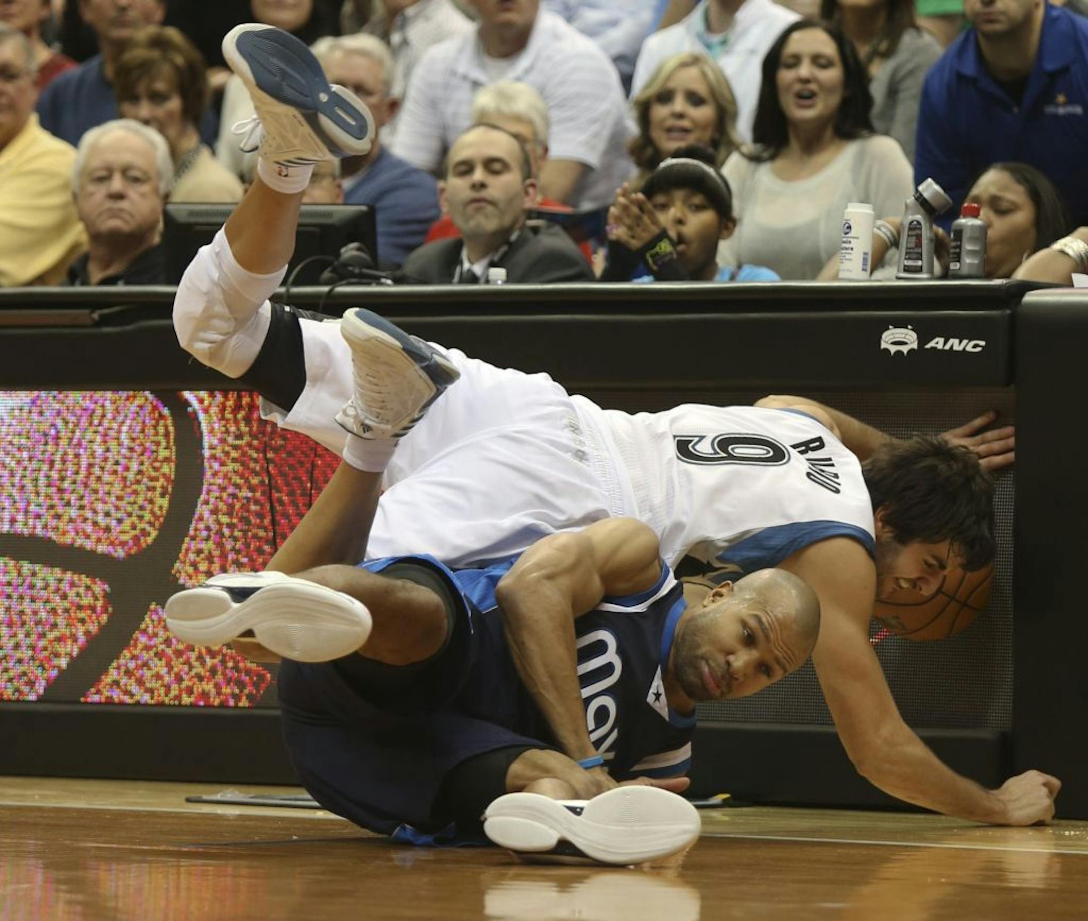 Ricky Rubio had eight points and nine assists in his Wolves season debut, and even got physical when he aggressively battled Dallas Mavericks guard Derek Fisher for a loose ball near the sideline Saturday.