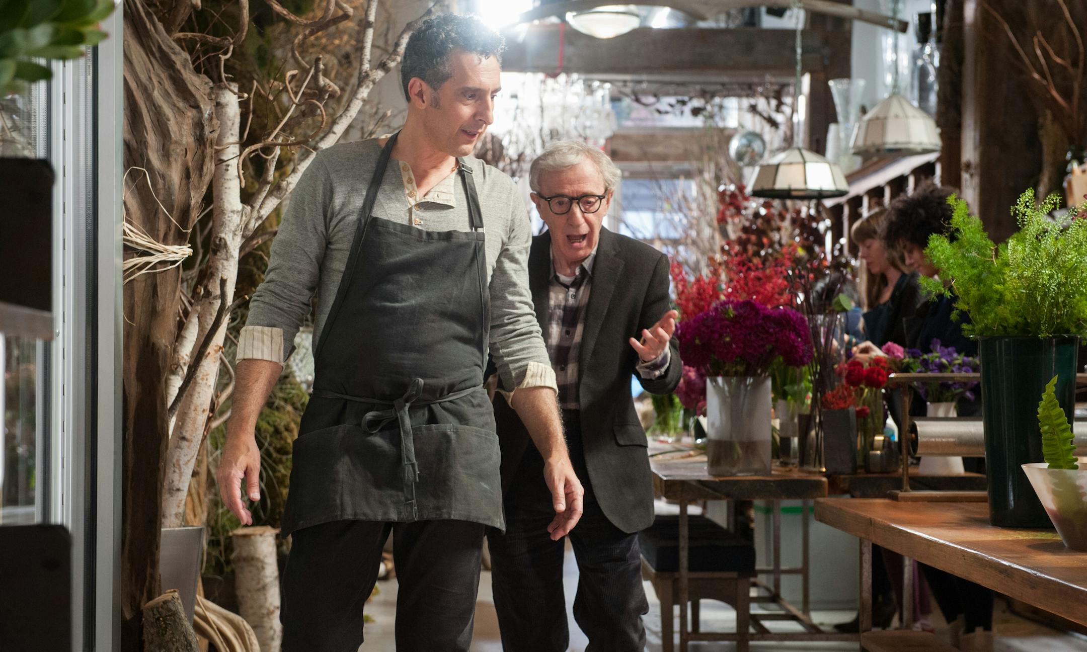 This image released by Millennium Entertainment shows John Turturro, left, and Woody Allen in a scene from "Fading Gigolo." (AP Photo/Millennium Entertainment, JoJo Whilden)
