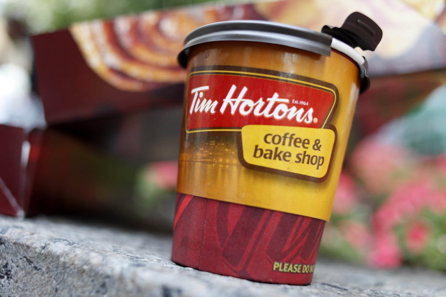 A Tim Hortons' coffee cup is seen in a New York store.