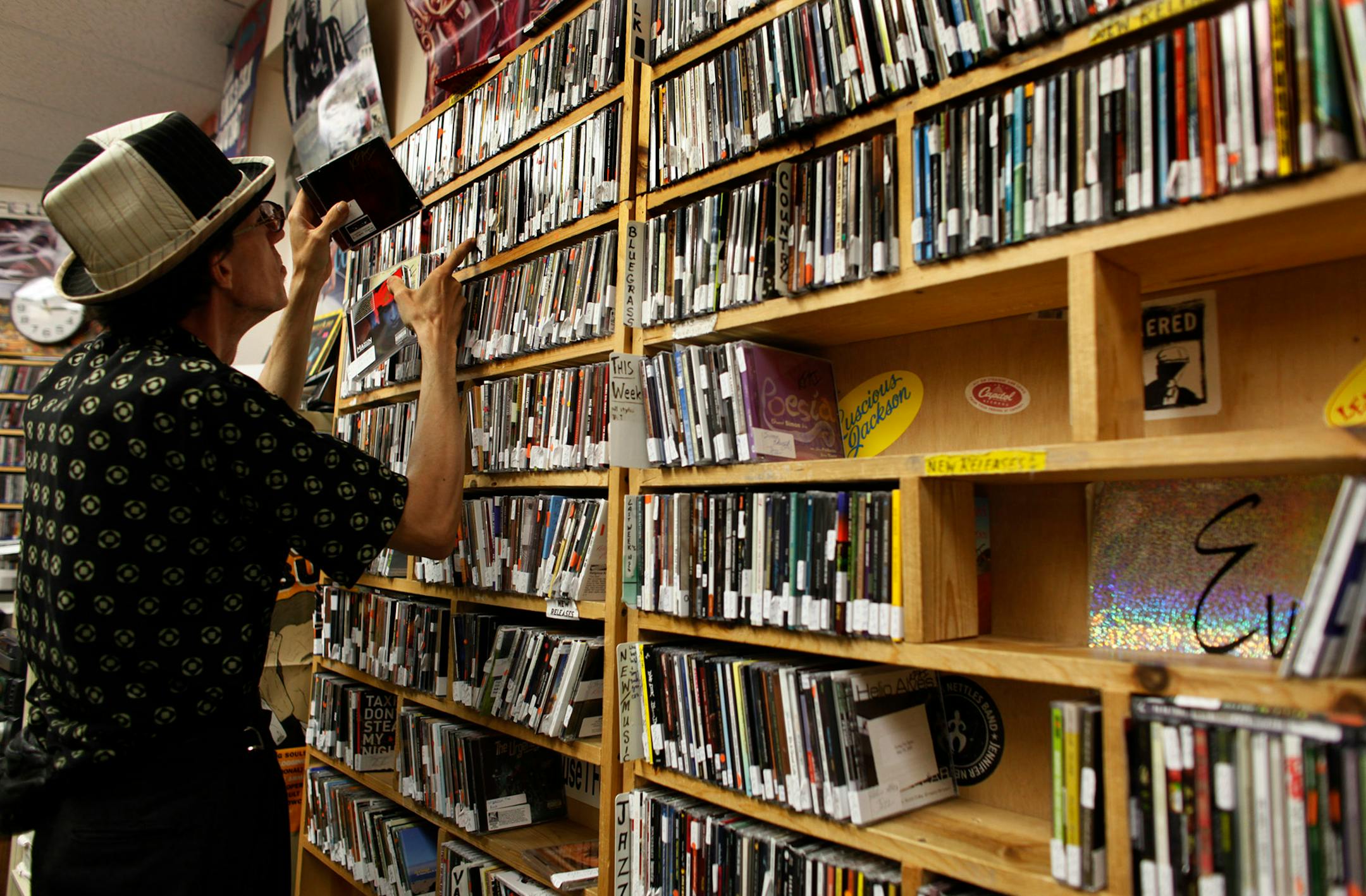 Host and volunteer Elmar Romain cataloged CDs back in 2009 at KFAI-FM's studios in Minneapolis' Cedar-Riverside area.