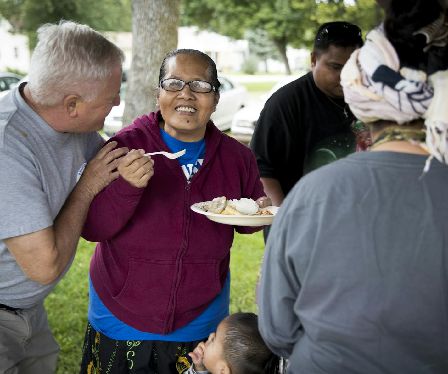 Richard Carlson, who lived in Micronesia in the Peace Corp, drove down from Brainard to attended a potluck with local Micronesians, like Fenciana Siko who is pictured, in Milan, Minn., on September 12, 2016. ] RENEE JONES SCHNEIDER &#x2022; renee.jones@startribune.com