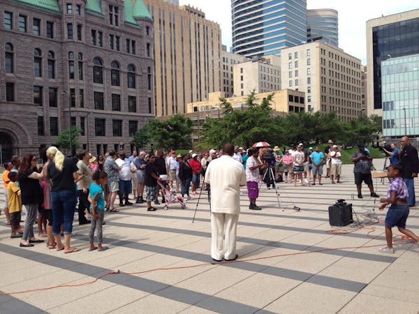 Several dozen people gathered at the federal courthouse in Minneapolis for a "Justice for Trayvon" rally on Saturday, July 20, 2013.