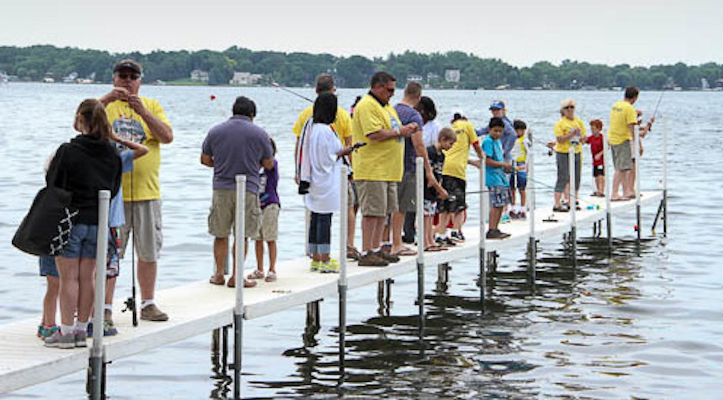 For the fourth year, the Minnetonka Power Squadron brought kids to Big Island on Lake Minnetonka to go boating and fishing as part of a partnership with Hope Kids. Photo submitted by Ross Langhans.