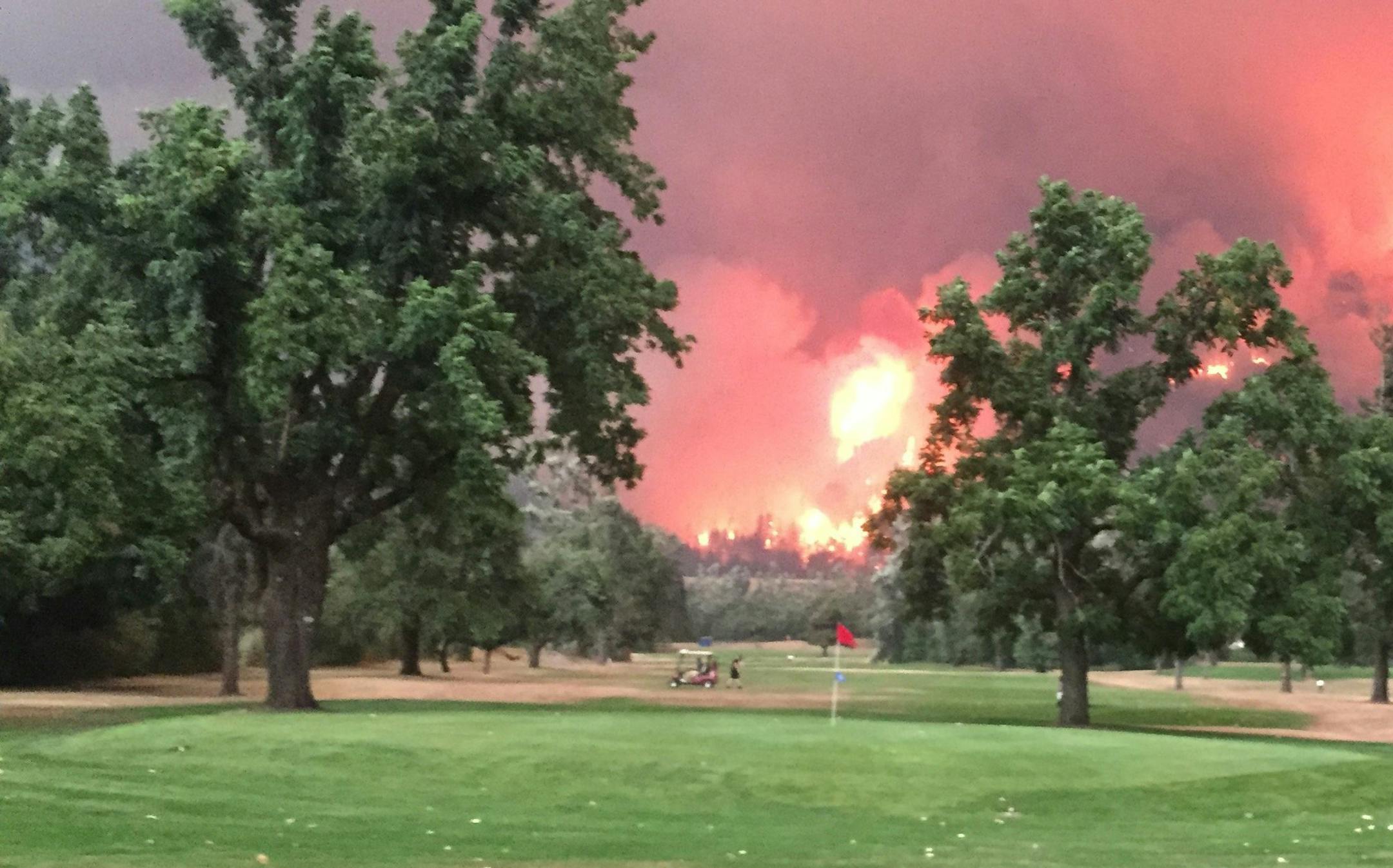 The wind-whipped Eagle Creek fire on the Oregon side of Columbia River Gorge, as viewed the evening of September 4, 2017, from Beacon Rock Golf Course on the Washington side. (Hal Bernton/Seattle Times/TNS)