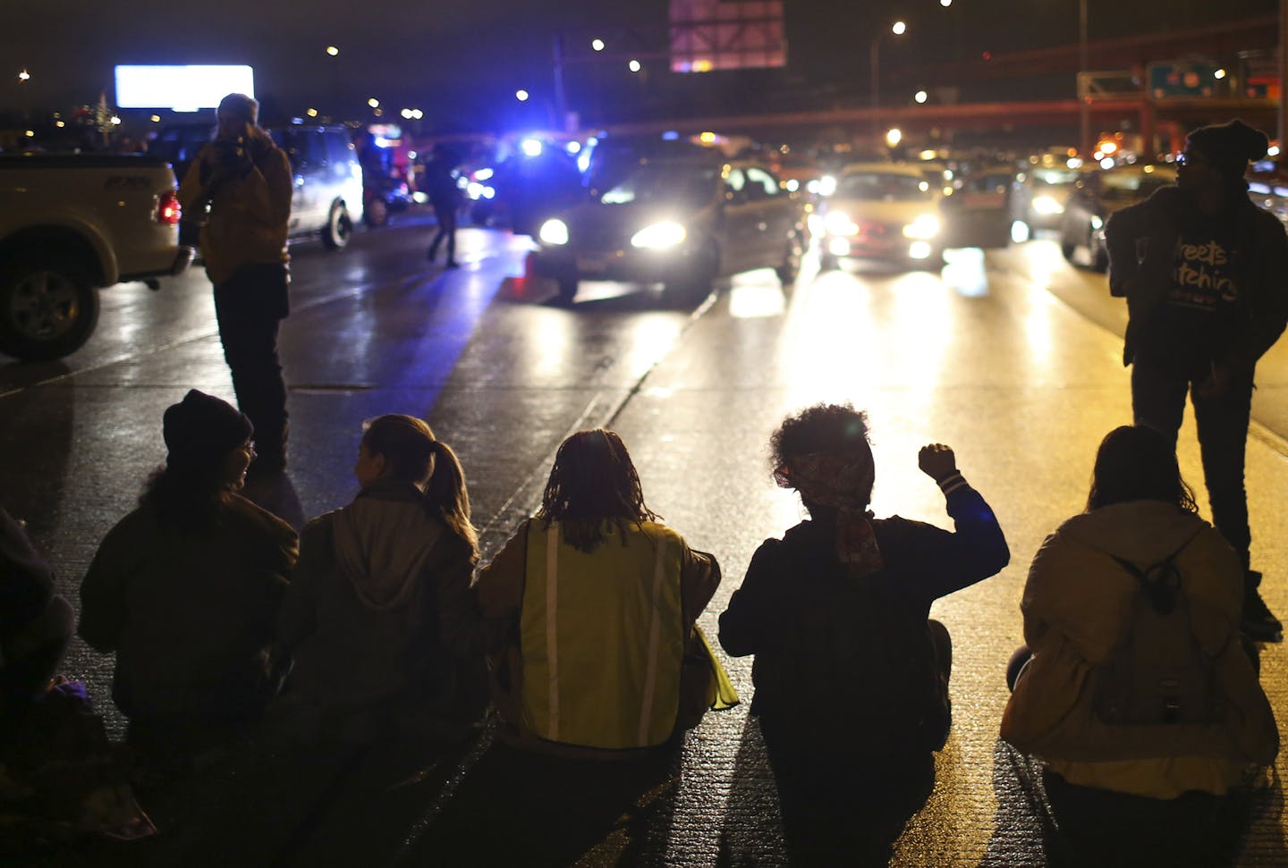 Protesters block traffic on I-94 on Monday, Nov. 16, 2015 in Minneapolis. Hundreds of people protesting the shooting of Jamar Clark on Sunday by a police officer near the precinct crossed onto Interstate 94, bringing traffic to a halt. (Jeff Wheeler/Star Tribune via AP) MANDATORY CREDIT; ST. PAUL PIONEER PRESS OUT; MAGS OUT; TWIN CITIES LOCAL TELEVISION OUT ORG XMIT: MIN2015111716175215