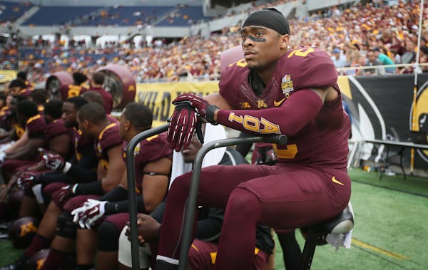 Gophers defensive back Cedric Thompson (2) watched from the bench late in the forth quarter. Missouri beat Minnesota 33-17 in the Citrus Bowl on Janua