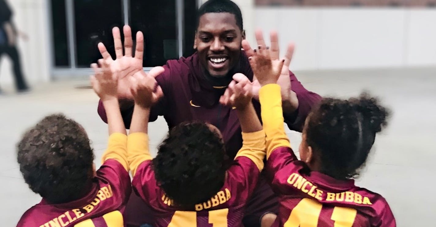 Thomas Barber got high fives from Dominique Barber's three children recently.