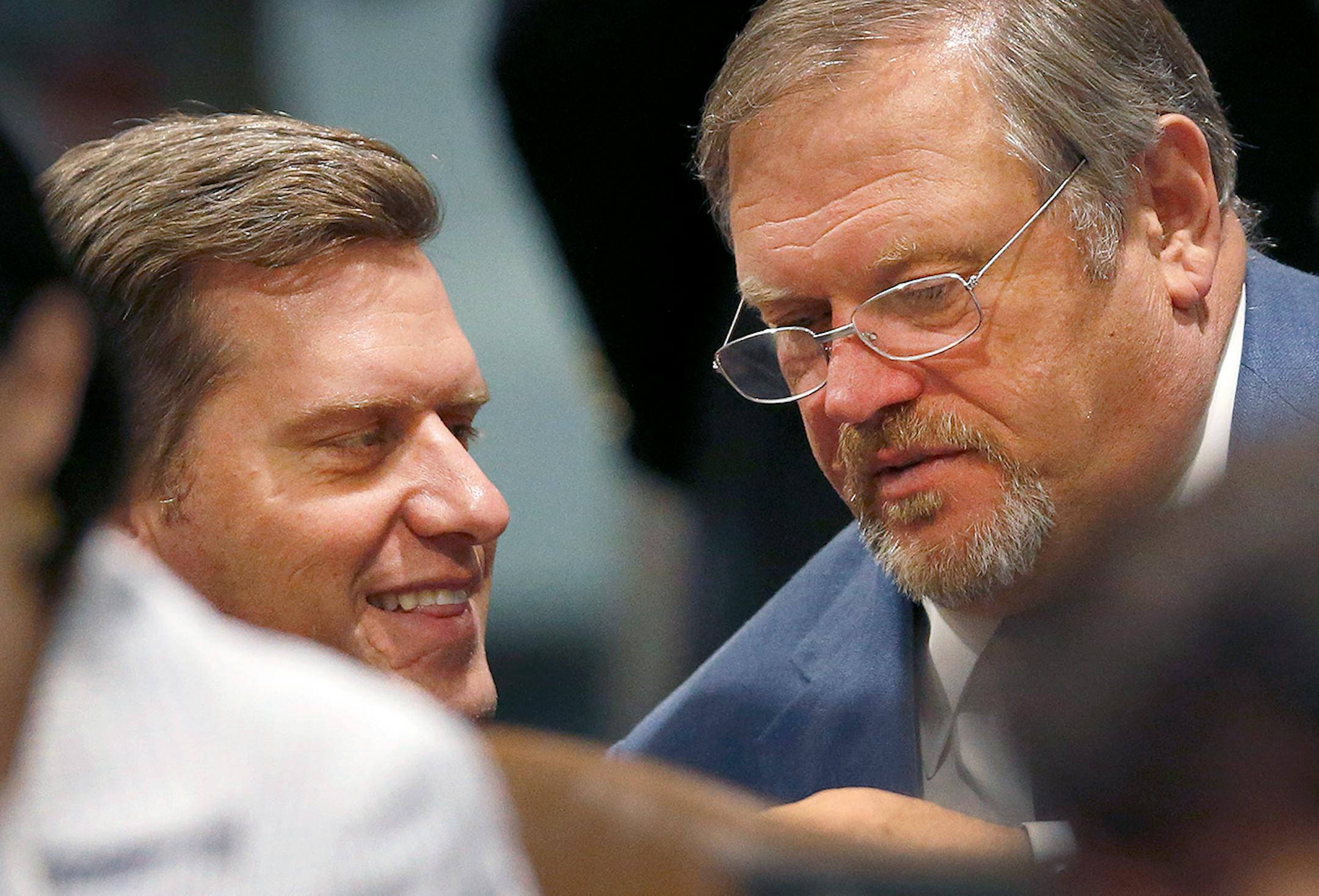 Speaker of the House Representatives Kurt Daudt (R) spoke with Senate Majority Leader Senator Tom Bakk (DFL) on the Senate floor during the final day of the 2016 legislative session.