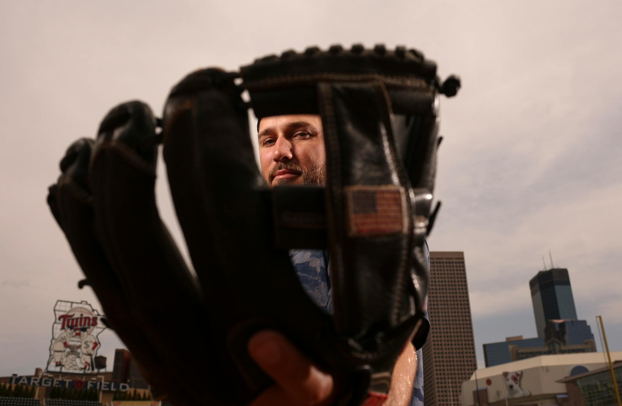 Minnesota Twins third baseman Trevor Plouffe with his glove.