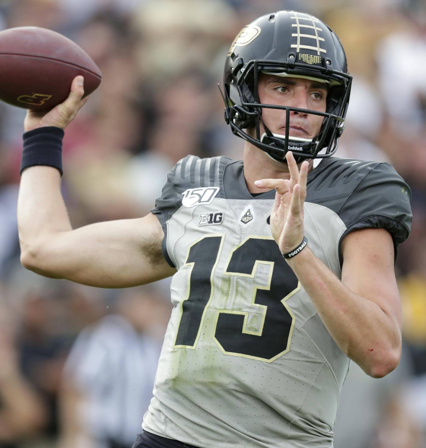 Purdue quarterback Jack Plummer (13) throws against Minnesota during the first half of an NCAA college football game in West Lafayette, Ind., Saturday, Sept. 28, 2019. (AP Photo/Michael Conroy)