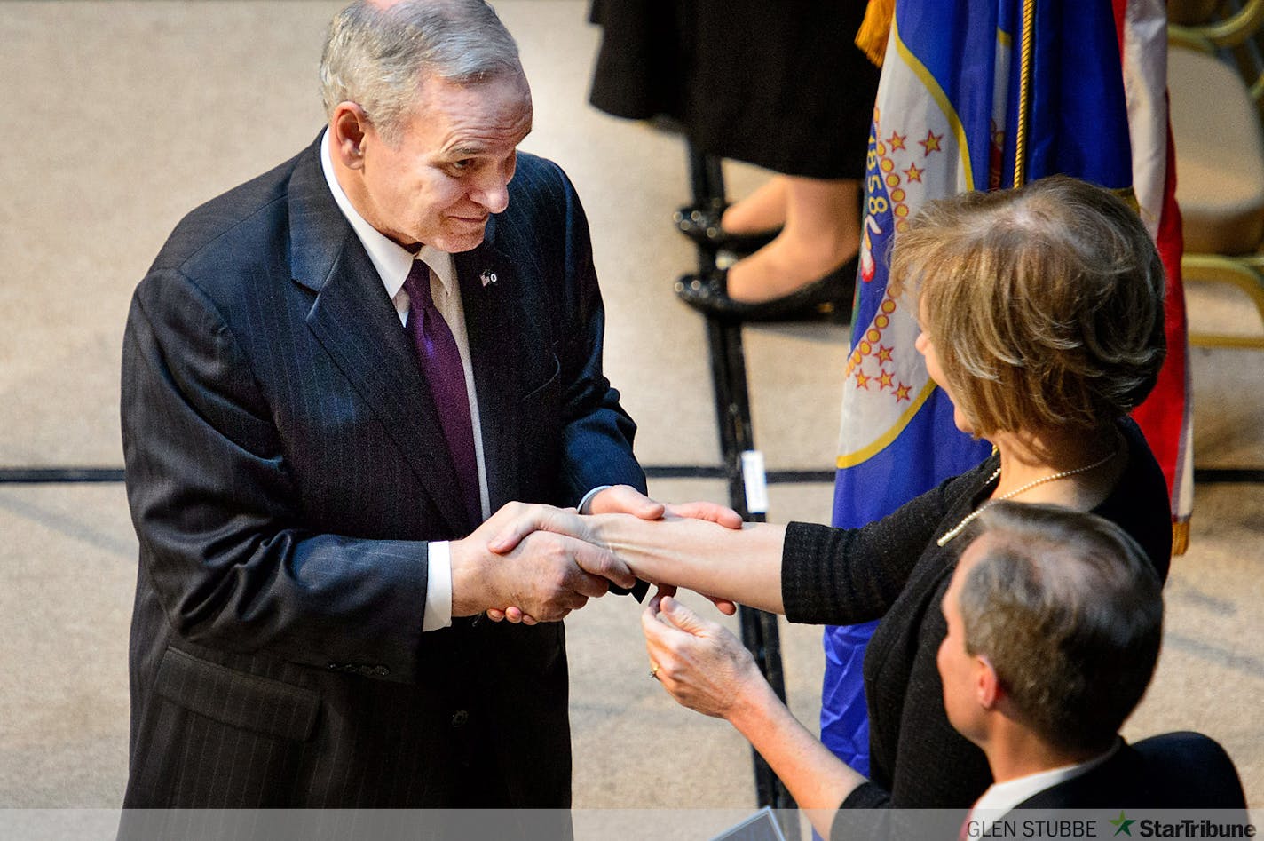 Governor Mark Dayton greets Lt. Governor Tina Smith after being sworn in.        ]   GLEN STUBBE * gstubbe@startribune.com   Monday January 5,  2015   Next Monday, January 5, Governor Mark Dayton and Lt. Governor-Elect Tina Smith will take the oath of office at an official inauguration ceremony beginning at 12:00pm at the Landmark Center in St. Paul.  138026