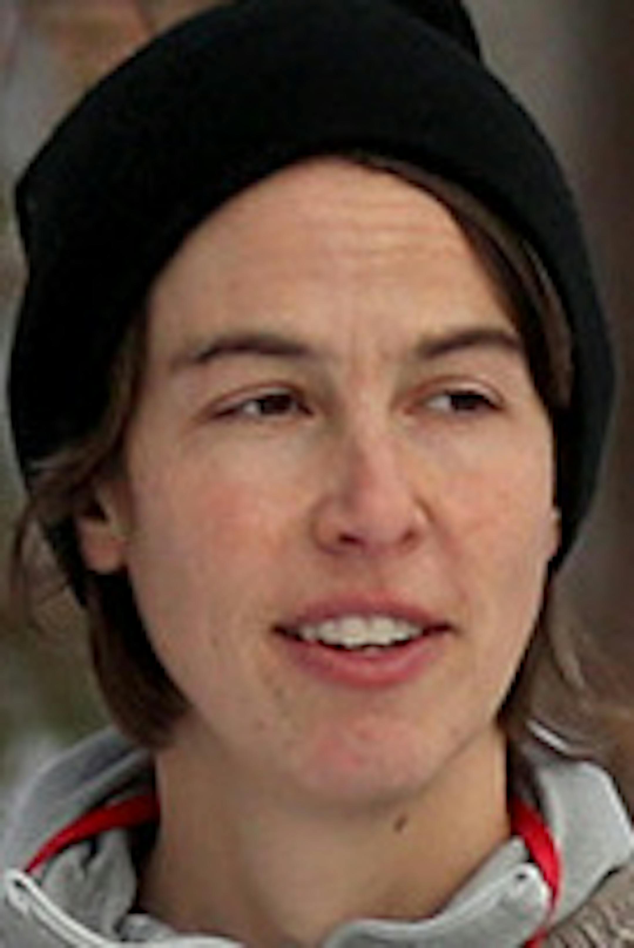 Free Forest School director Anna Sharratt brought her program to Dowling Elementary School in September where she regularly encourages first graders to discover and explore outside as part of their learning. Here, Sharratt, left, talked to a student as first graders in Bejay Johnson's class at Dowling frolicked in the snow and woods Friday, Dec. 8, 2017, Minneapolis, MN.] DAVID JOLES ï david.joles@startribune.com Free Forest School of Minnesota is bucking institution preK learning, and emph