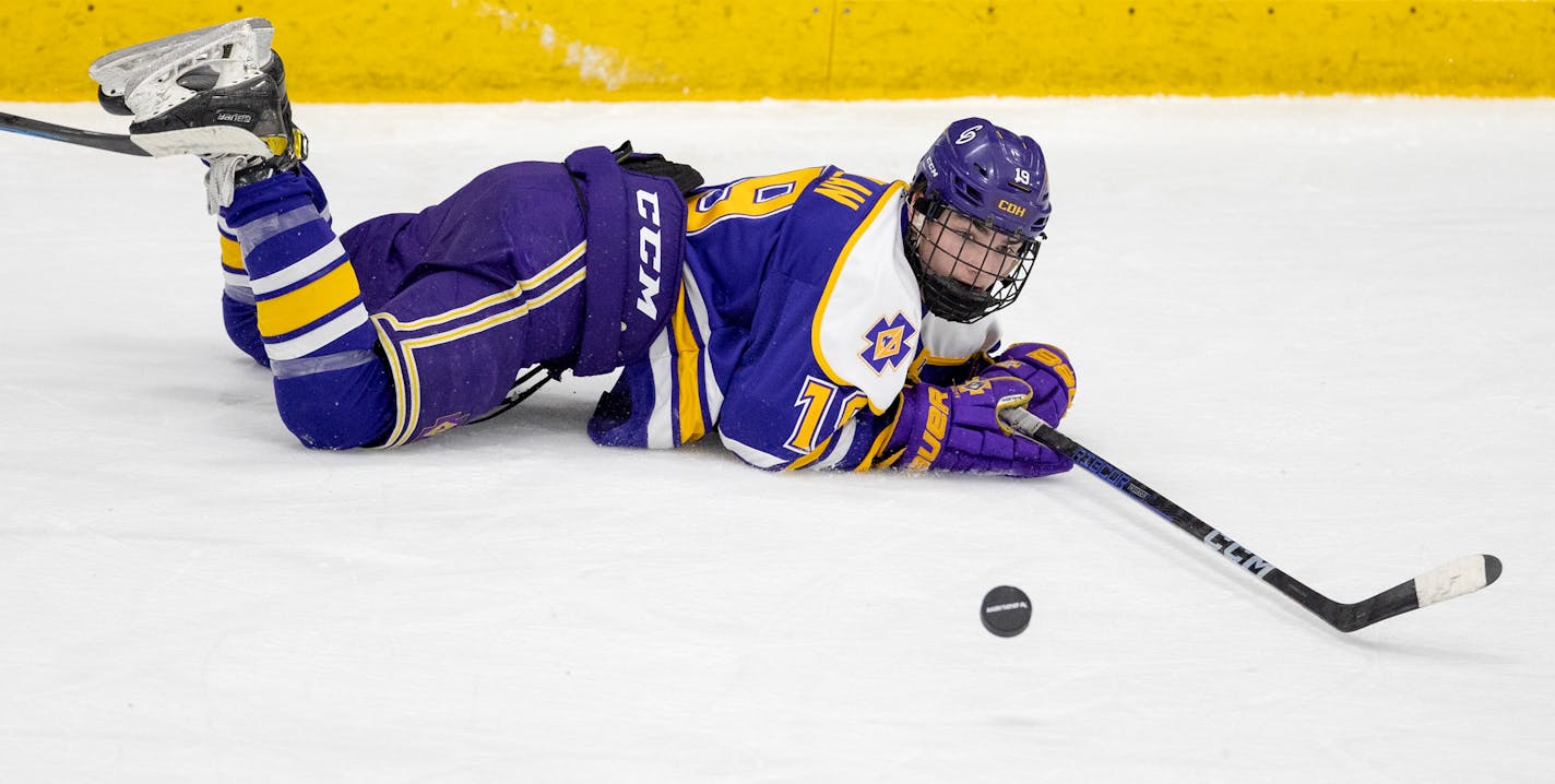 Colin Scanlan (19) of Cretin-Derham Hall eyes the puck in the second period during the boy's hockey section 3AA Finals, Wednesday, March 1, 2023, at Braemar Ice Arena in Edina, Minn. ] CARLOS GONZALEZ • carlos.gonzalez@startribune.com.