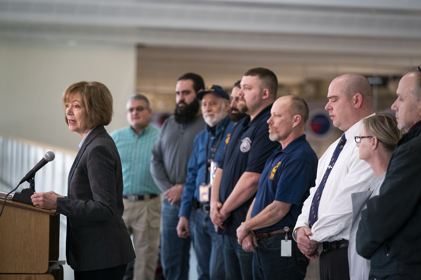 U.S. Sen. Tina Smith (D-Minn.) holds a news conference with federal workers who have been impacted by the government shutdown. ] LEILA NAVIDI &#xa5; leila.navidi@startribune.com BACKGROUND INFORMATION: U.S. Sen. Tina Smith (D-Minn.) holds a news conference with Minnesotans hurt by the ongoing federal government shutdown to discuss the shutdown's implications for the state at Minneapolis-St. Paul International Airport in Bloomington on Friday, January 11, 2019. Friday marks the day many federal e