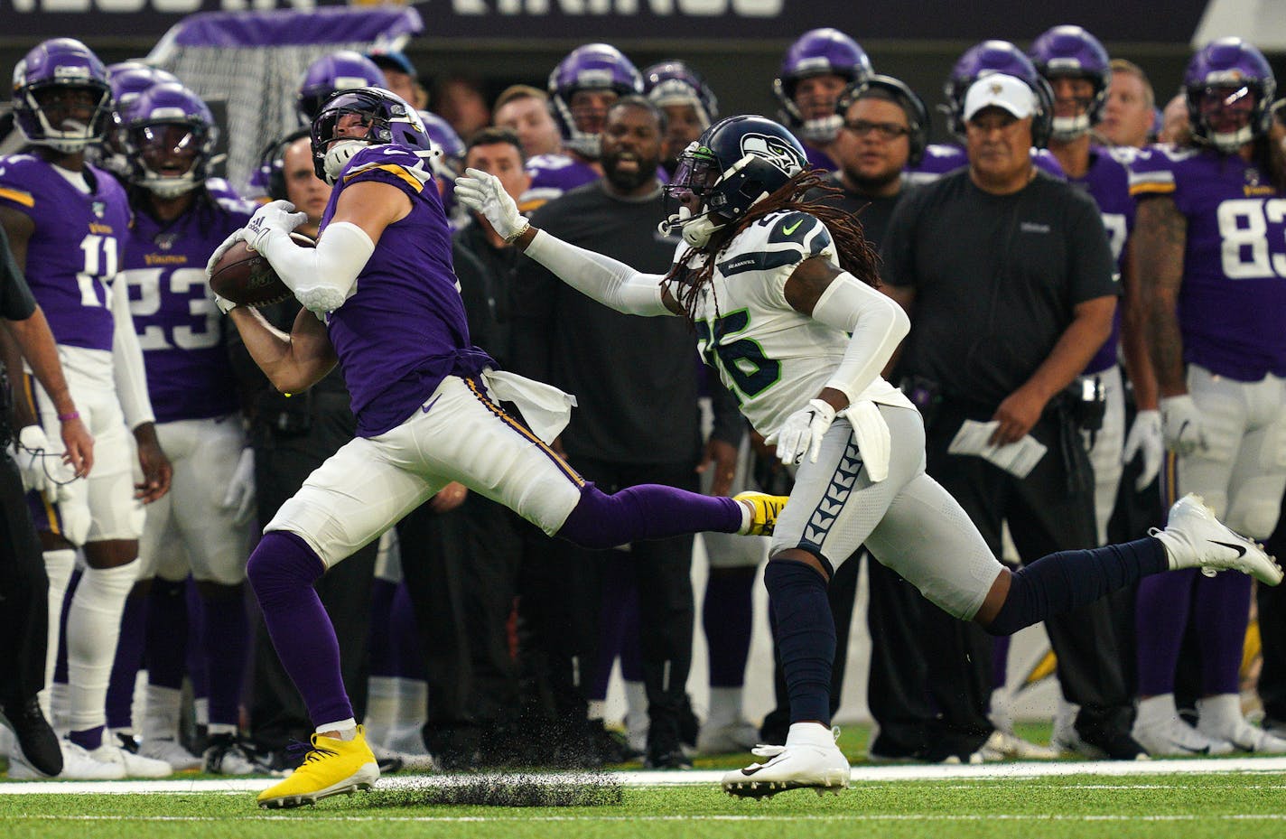 Minnesota Vikings wide receiver Adam Thielen (19) completed a long pass from Minnesota Vikings quarterback Kirk Cousins (8) as Seattle Seahawks cornerback Shaquill Griffin tried to defend in the first half. ] ANTHONY SOUFFLE &#x2022; anthony.souffle@startribune.com The Minnesota Vikings played the Seattle Seahawks in an NFL Preseason game Sunday, Aug. 18, 2019 at U.S. Bank Stadium in Minneapolis.