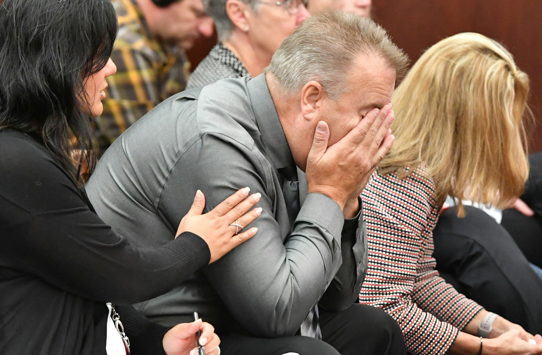 David Ruki put his hands to his face and wiped away tears after giving his impact statement to the court. ] GLEN STUBBE * gstubbe@startribune.com Wednesday, September 21, 2016 Sentencing for Sandra Grazzini-Rucki, who was found guilty in Dakota County in July for hiding her two teenage daughters for more than two years during a bitter custody battle.