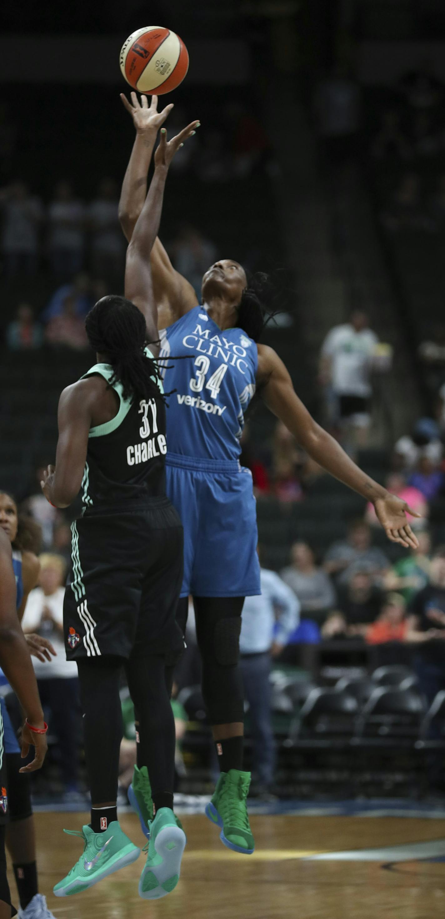 Minnesota Lynx center Sylvia Fowles (34) tipped the ball to the Liberty before New York Liberty center Tina Charles (31) could at the start of their game Tuesday night. ] JEFF WHEELER &#xef; jeff.wheeler@startribune.com The Minnesota Lynx faced the New York Liberty in a nationally televised WNBA basketball game Tuesday night, July 25, 2017 at Xcel Energy Center in St. Paul.