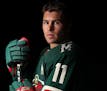 The Wild's Zach Parise is working through his second back injury in as many years, casting a shadow on the team's season opener. His relentless energy