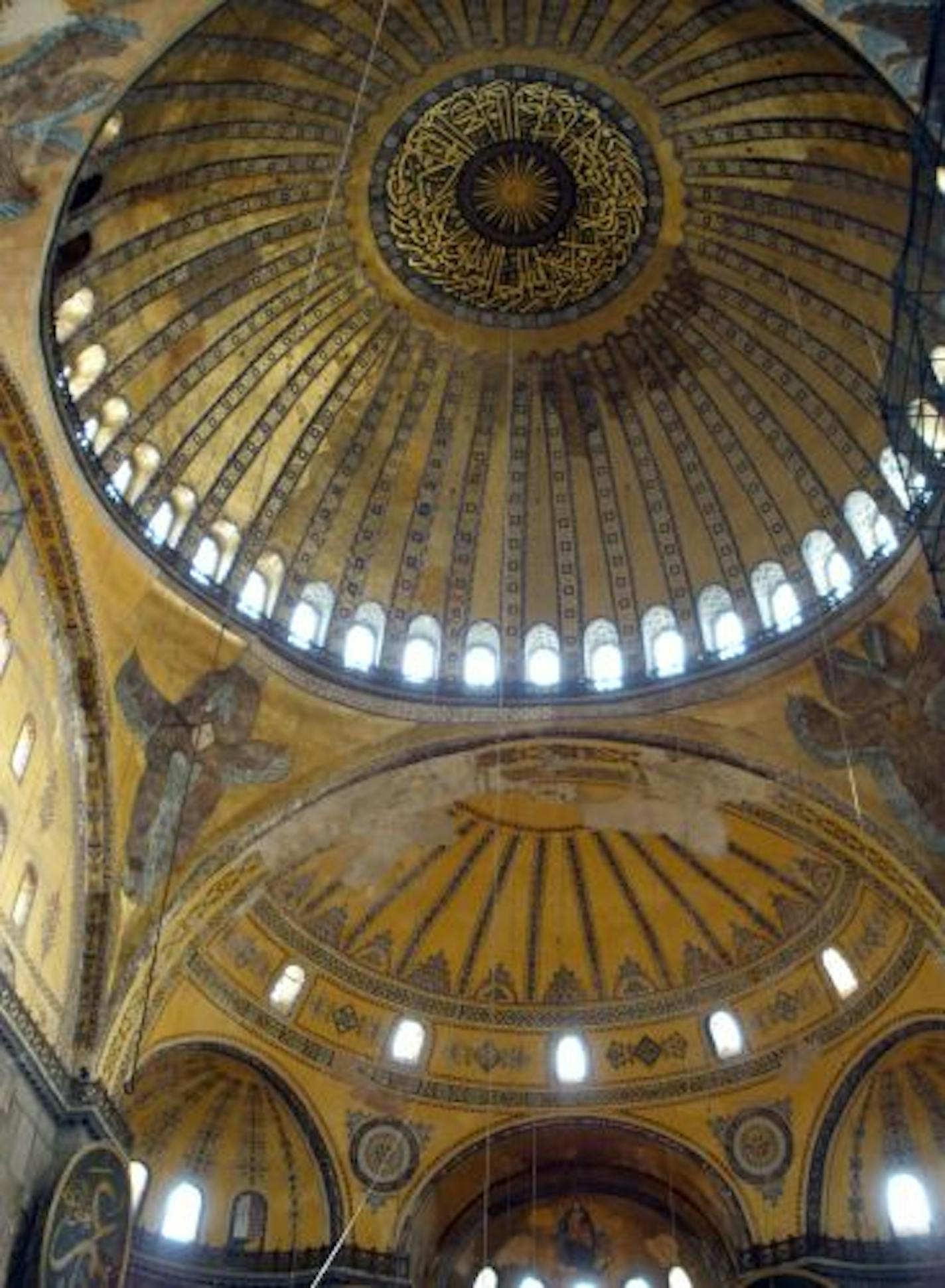 The Aya Sofia in the tourism section of Istanbul known as Sultanahmed shows the combined decor of Christian and Muslim worshippers.