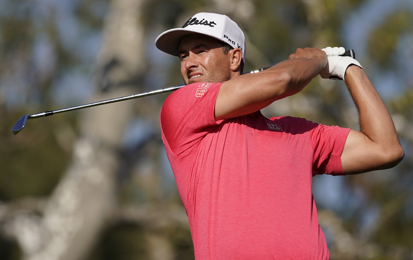 Adam Scott, of Australia, tees off on the 16th hole during the final round of the Genesis Invitational golf tournament at Riviera Country Club, Sunday, Feb. 16, 2020, in the Pacific Palisades area of Los Angeles. (AP Photo/Ryan Kang)