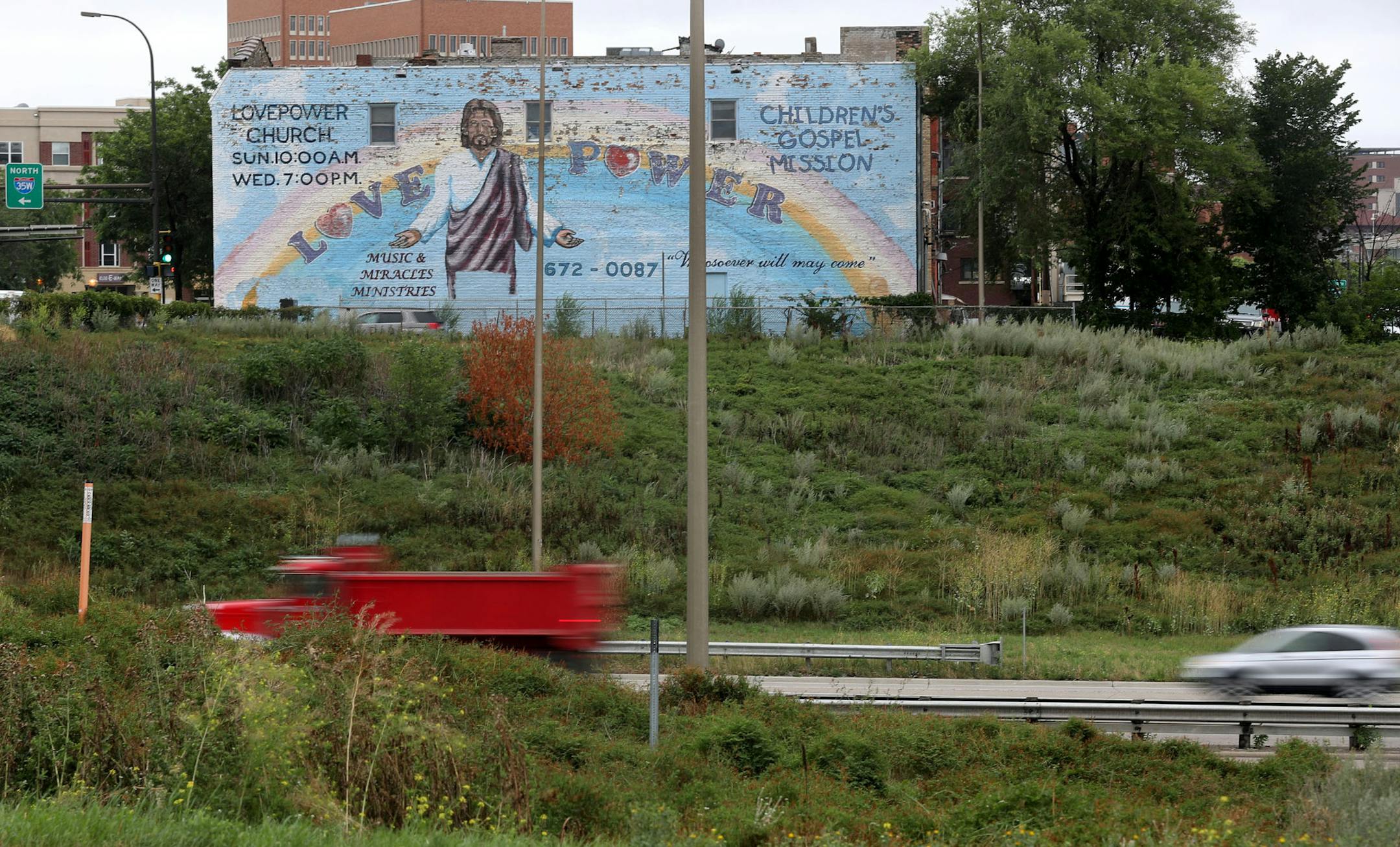 "Love Power" Jesus mural in Minneapolis' West Bank neighborhood Thursday, Aug. 3, 2017, in Minneapolis, MN.] DAVID JOLES ï david.joles@startribune.com The history behind the West Bank Jesus mural and the place it plays in local imaginations. Generations of Minnesotans have encountered the mural while driving on 35W. Where did it come from? Who painted it? What does it mean to all of us?