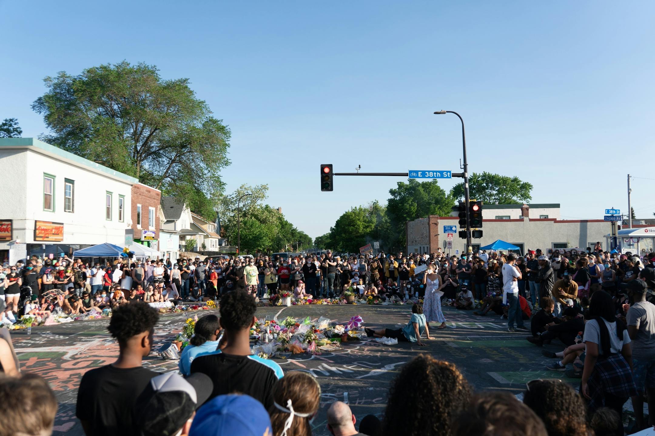 Hundreds of people gathered for conversation, food and healing outside of Cup Foods at 38th Street and Chicago Avenue.