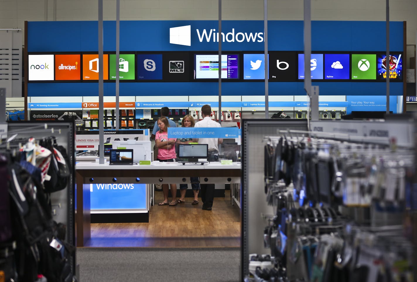 With its recent partnerships with Samsung and Microsoft, Best Buy has been one of the most aggressive proponent of the store within a store concept. The Windows store in Best Buy in Richfield, Minn. on Wednesday, July 10, 2013. ] (RENEE JONES SCHNEIDER * reneejones@startribune.com)