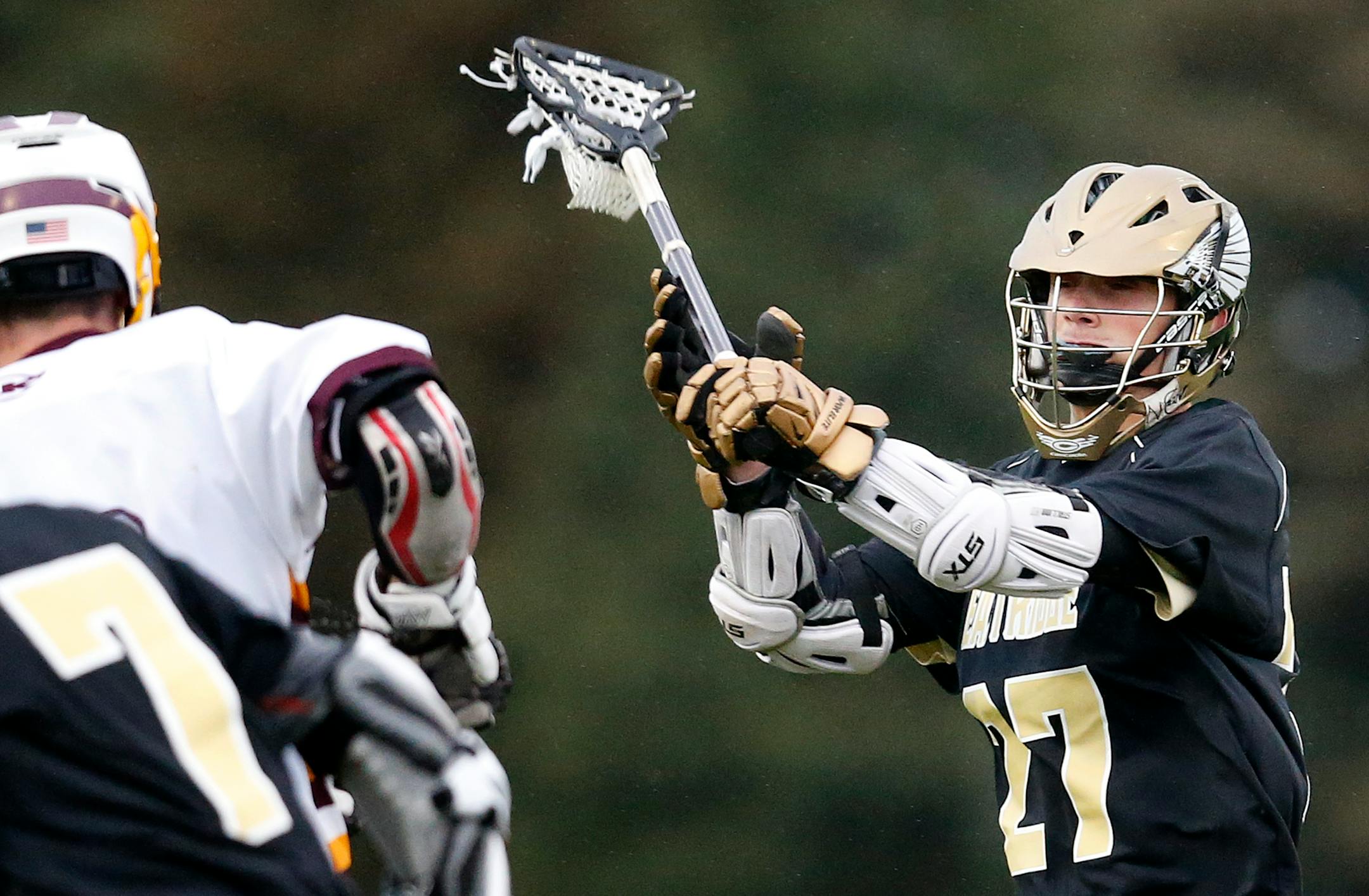 Drew Nicholson (27) of East Ridge during a game vs. Forest Lake. ] CARLOS GONZALEZ cgonzalez@startribune.com, May 18, 2015, Forest Lake, MN, Forest Lake vs. East Ridge in Boys High / Prep School Lacrosse,