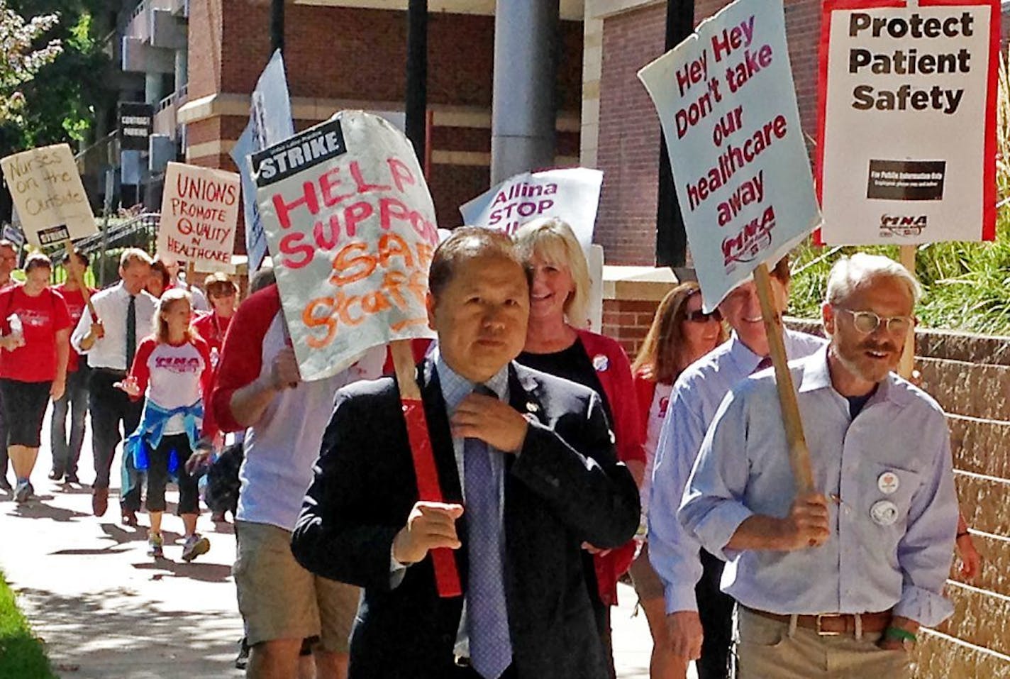 State Sen. Foung Hawj, DFL-St. Paul, and Rep. Ray Dehn, DFL-Minneapolis, joined nurses picketing at Abbott Northwestern Hospital in Minneapolis Monday afternoon. Two dozen state lawmakers joined the Minnesota Nurses Association to offer their support to striking nurses.