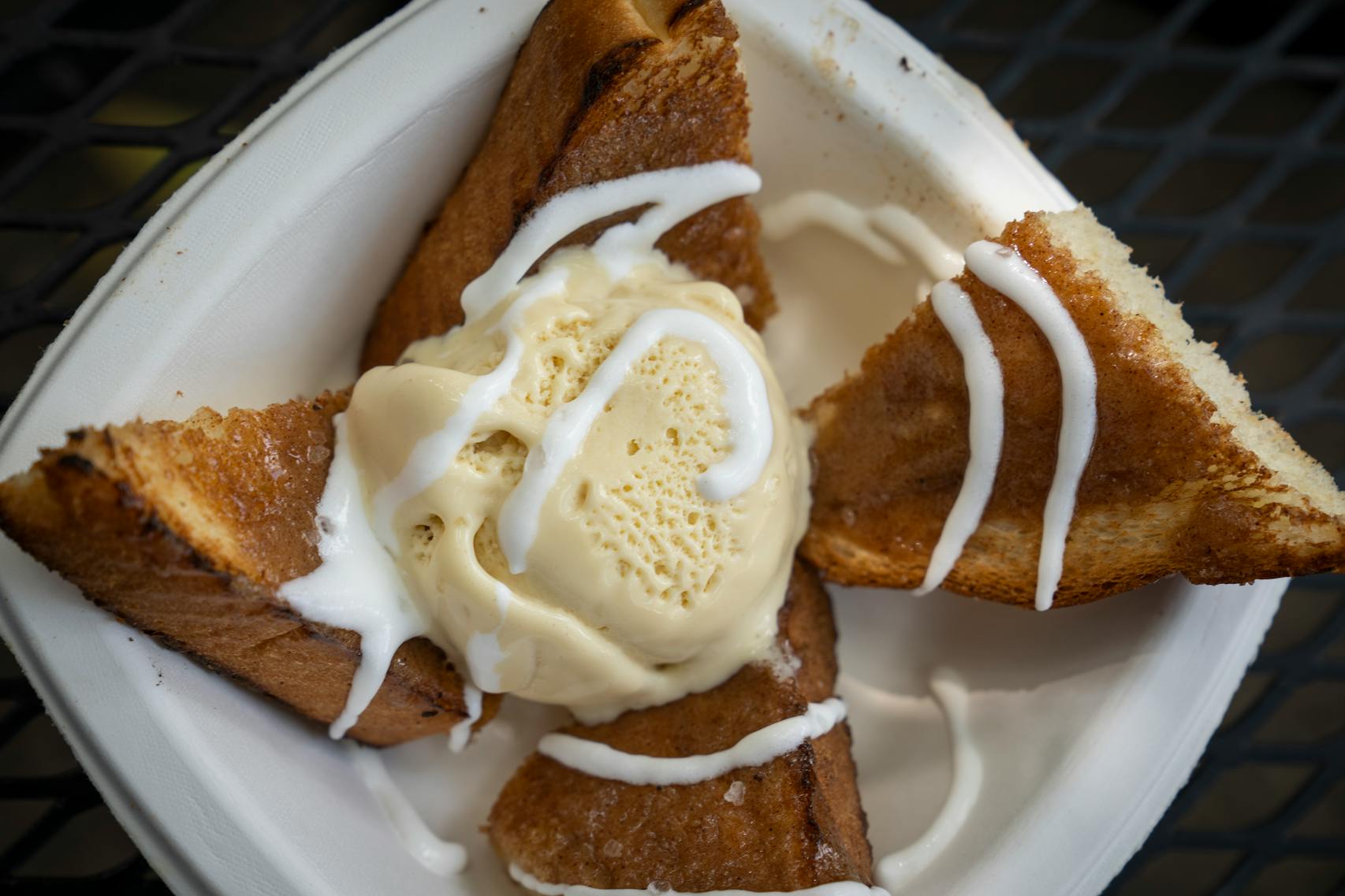 Irish Butter Ice Cream Over Brown Sugar Cinnamon Toast from Blue Moon Dine-In Theater. The new foods of the 2023 Minnesota State Fair photographed on the first day of the fair in Falcon Heights, Minn. on Tuesday, Aug. 8, 2023. ] LEILA NAVIDI • leila.navidi@startribune.com