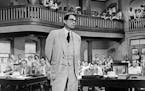 FILE - Gregory Peck is shown as attorney Atticus Finch, a small-town Southern lawyer who defends a black man accused of rape, in a scene from the 1962