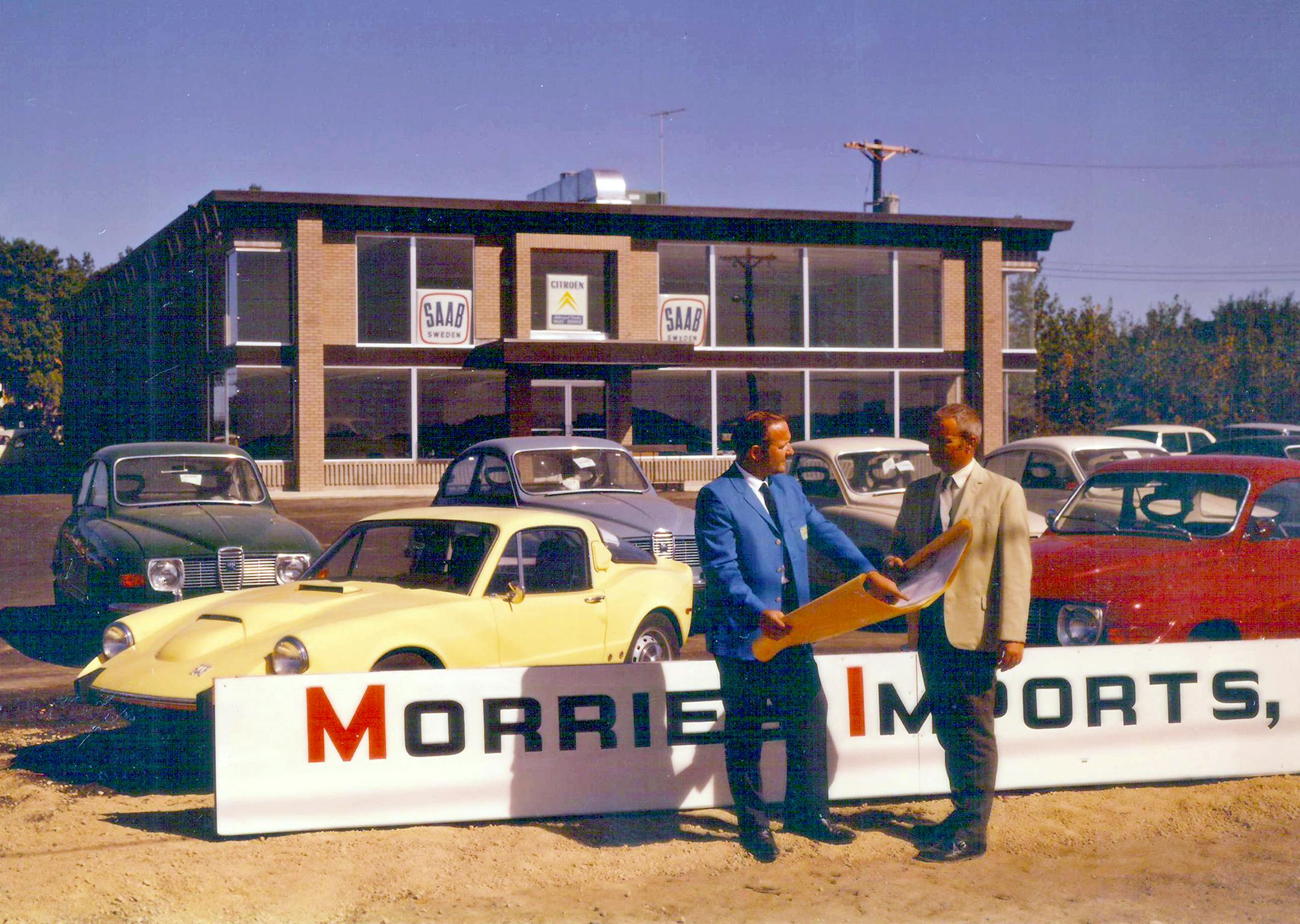 Vintage photo of the original Morrieís Imports building dating back to 1969. Morrie himself is wearing the blue jacket in the photo. The building itself has seen a number of changes including a remodel that is currently underway. It is the current home of Morrieís Minnetonka Subaru.
