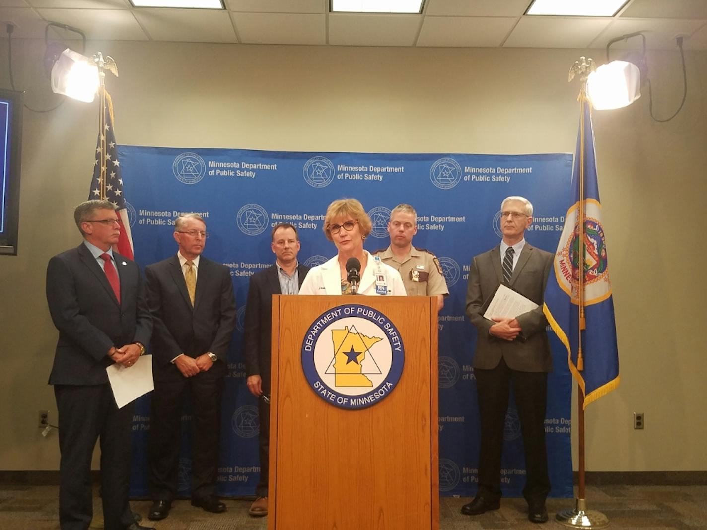 Representatives from the State Patrol, the Department of Public Safety, Fairview Health Services, Minnesota Safety Council, the Minnesota Trucking Association and the Insurance Federation of Minnesota talked about the importance of the hands-free law during a news conference June 27, 2019, in St. Paul.