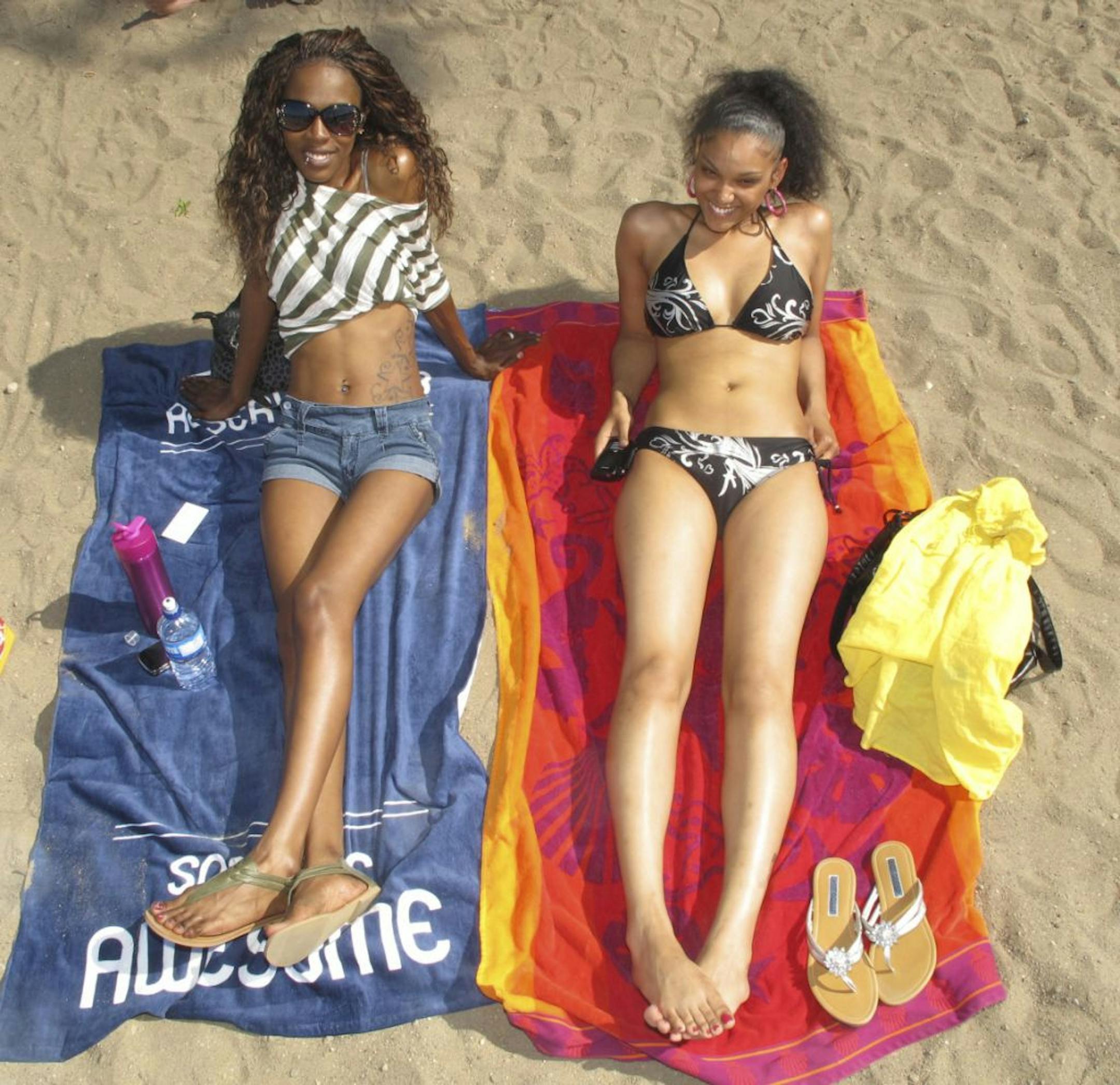 Swimsuit style captured at Lake Calhoun's Thomas Beach:
Nicole Kendrick and Shanika Williams