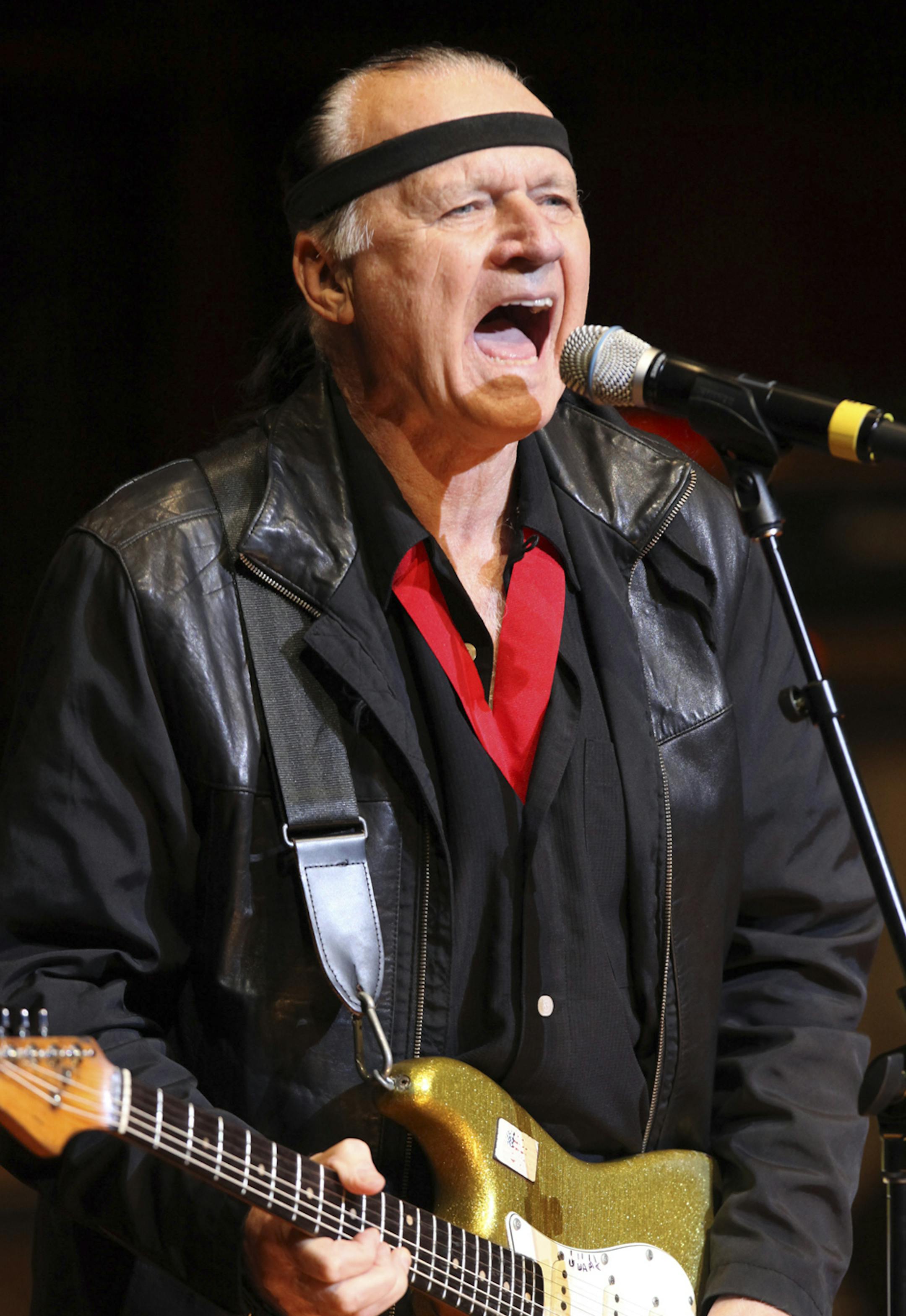Dick Dale performs at the Musicians Hall of Fame awards show at the Schermerhorn Symphony Center in Nashville, Tenn., Monday, Oct. 12, 2009. (AP Photo/Josh Anderson) ORG XMIT: MIN2013070908365702