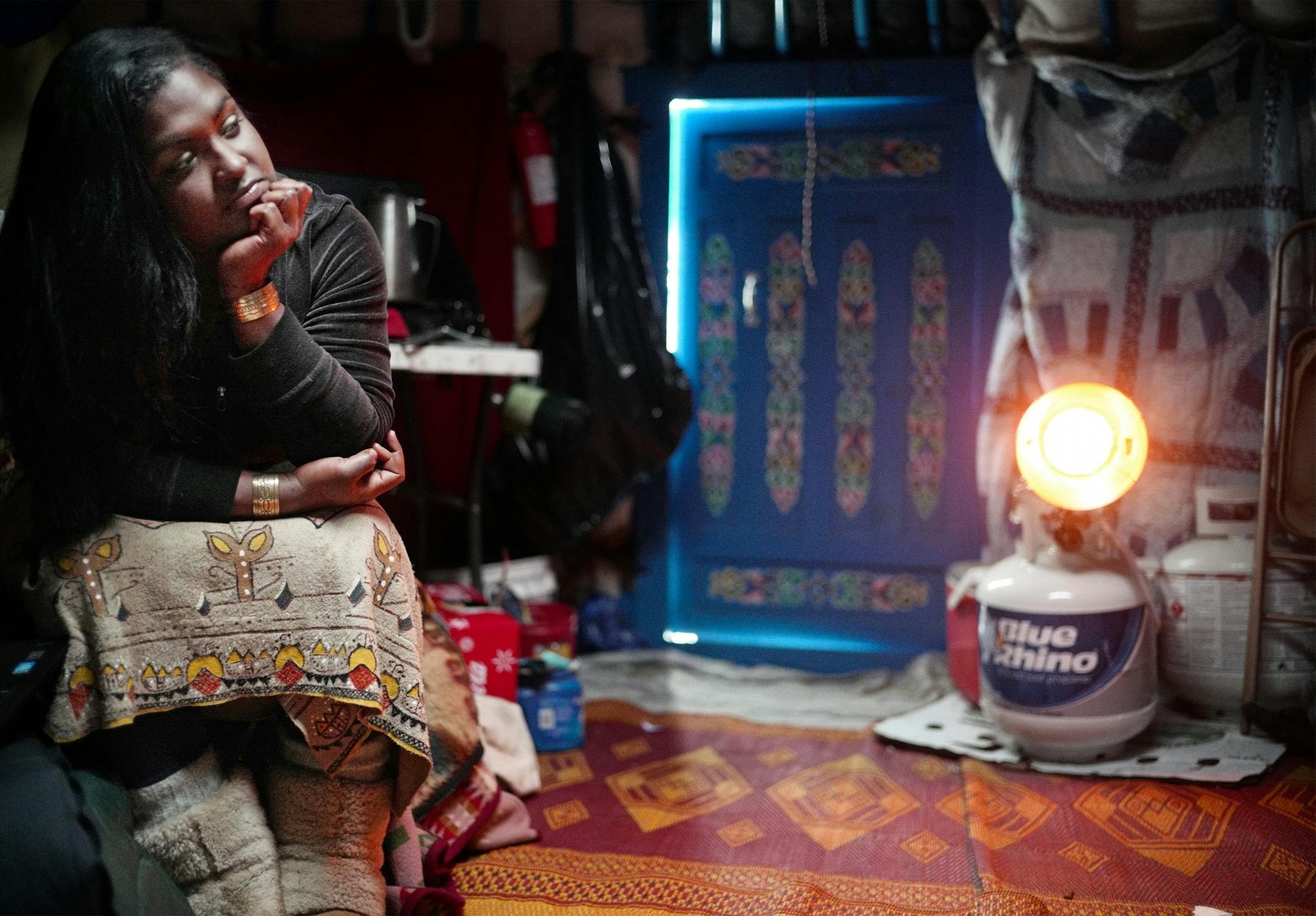 China Bullock, 28, a Long Island Shinnecock, was waiting for her computer to boot up. "I am protecting Mother Earth. I am making sure my relatives out here are secure for the winter."