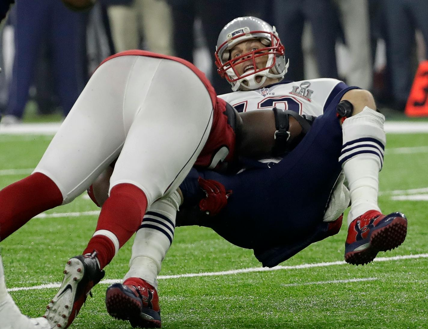 Atlanta Falcons' Grady Jarrett sacks New England Patriots' Tom Brady during the second half of the NFL Super Bowl 51 football game Sunday, Feb. 5, 2017, in Houston. (AP Photo/David J. Phillip)