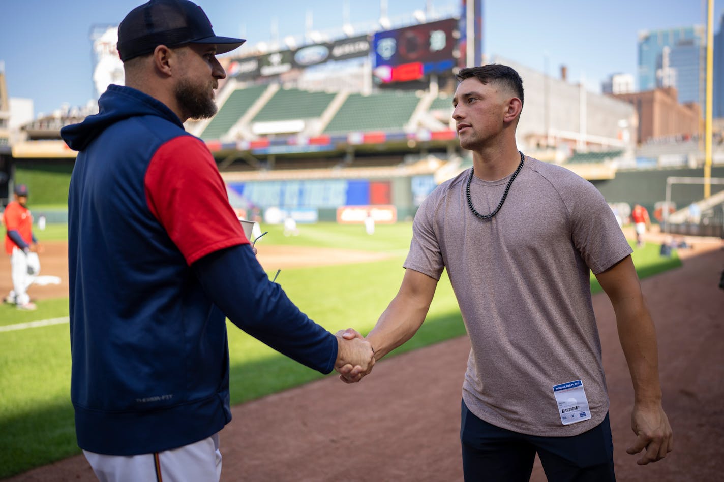 Twins manager Rocco Baldelli, left, greeted Twins first round draftee Brooks Lee at Target Field in Minneapolis, Minn. Monday afternoon, August 1, 2022. The Minnesota Twins faced the Detroit Tigers in an MLB baseball game. ] JEFF WHEELER • Jeff.Wheeler@startribune.com