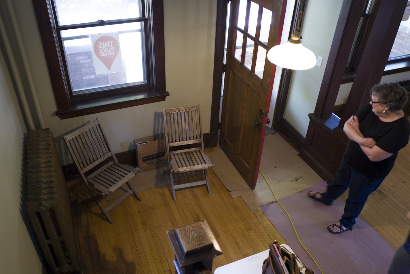 Carol Carey stood in entry way of a 1,600-sq-ft single-family home located at 493 Edmund Avenue Thursday June 16, 2016 in St. Paul, MN.] This house is the most recent project of Preserve Frogtown a partnership of Frogtown Neighborhood and historic Saint Paul. Jerry Holt /Jerry.Holt@Startribune.com